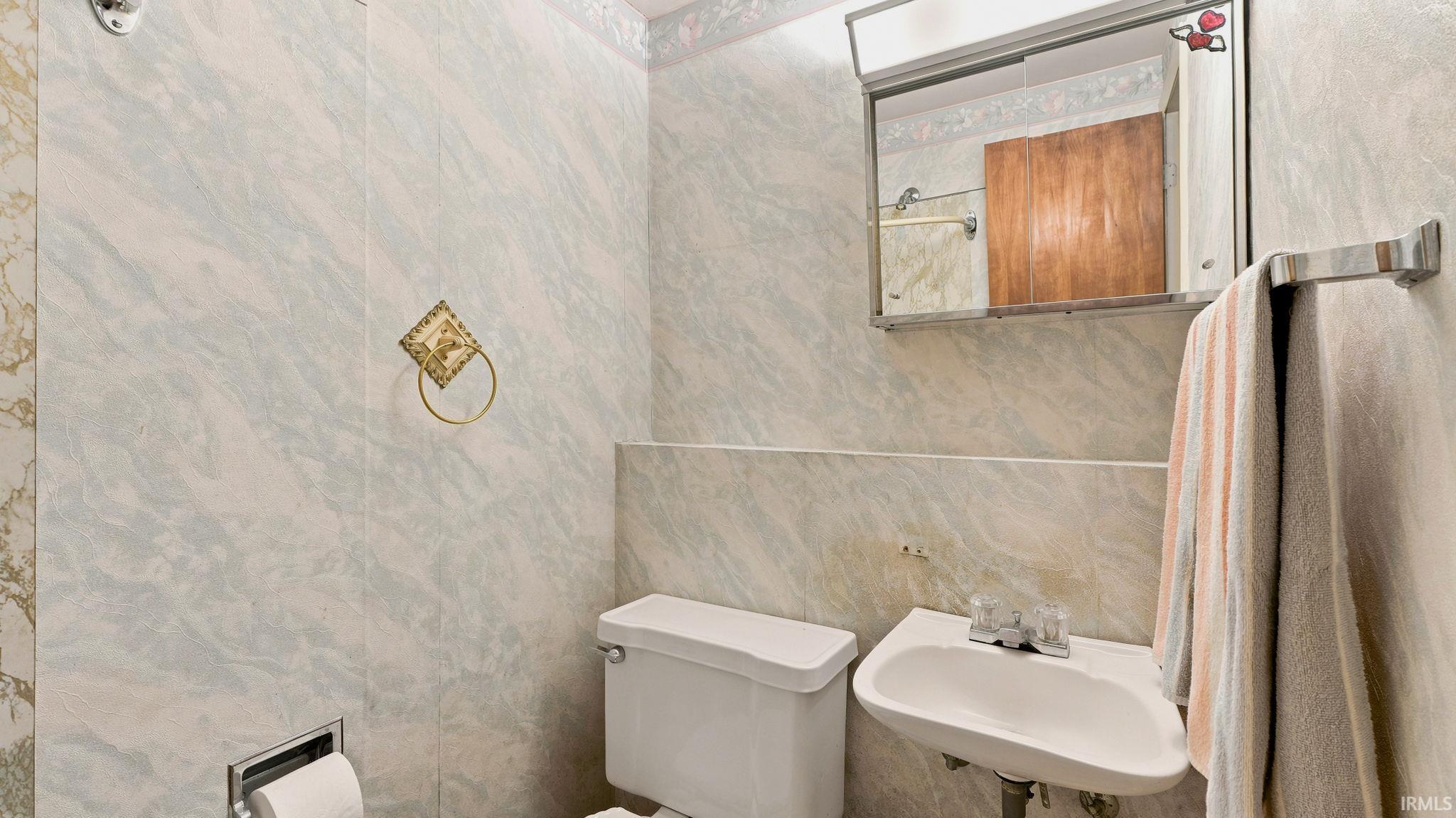 Standing shower in Lower level bath near laundry