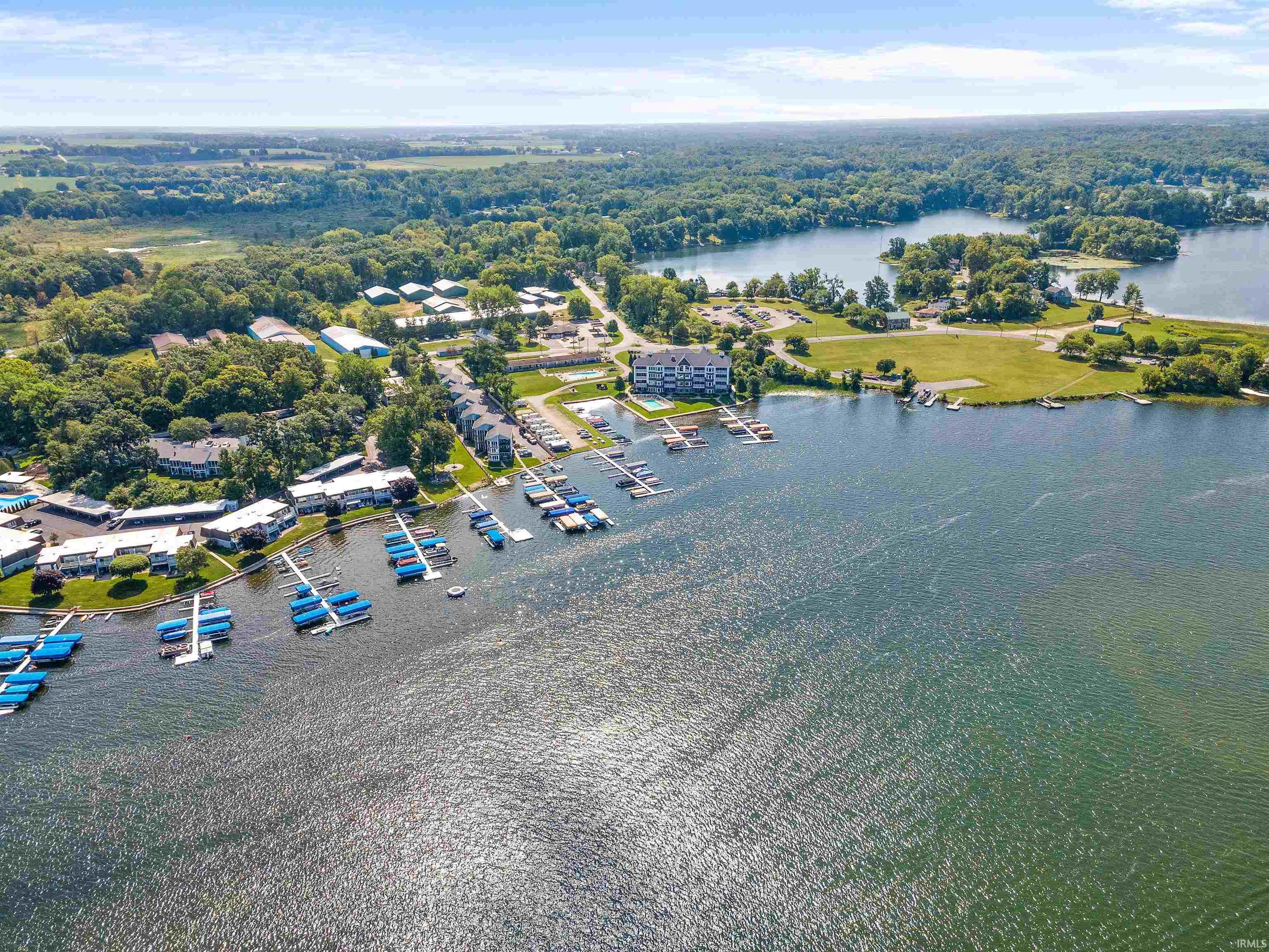 Expansive body of water with multiple boat slips and docks