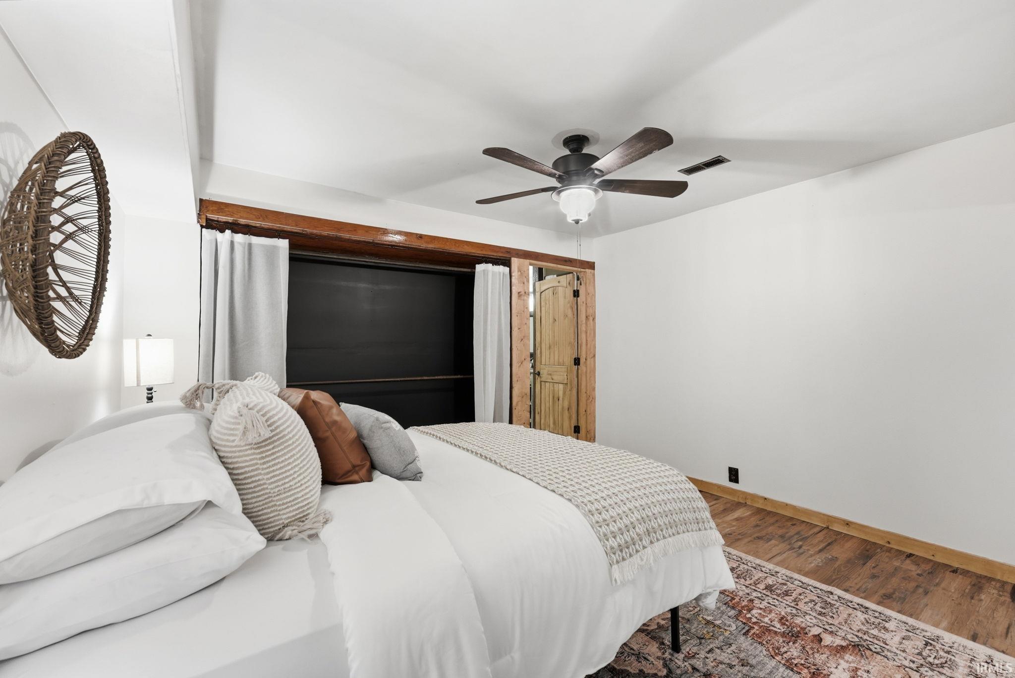 Wood-finish flooring with a ceiling fan