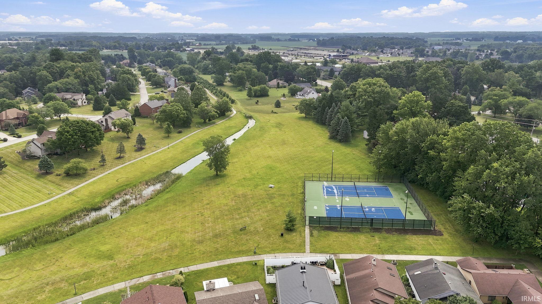 Aerial perspective showcasing residential properties and community amenities