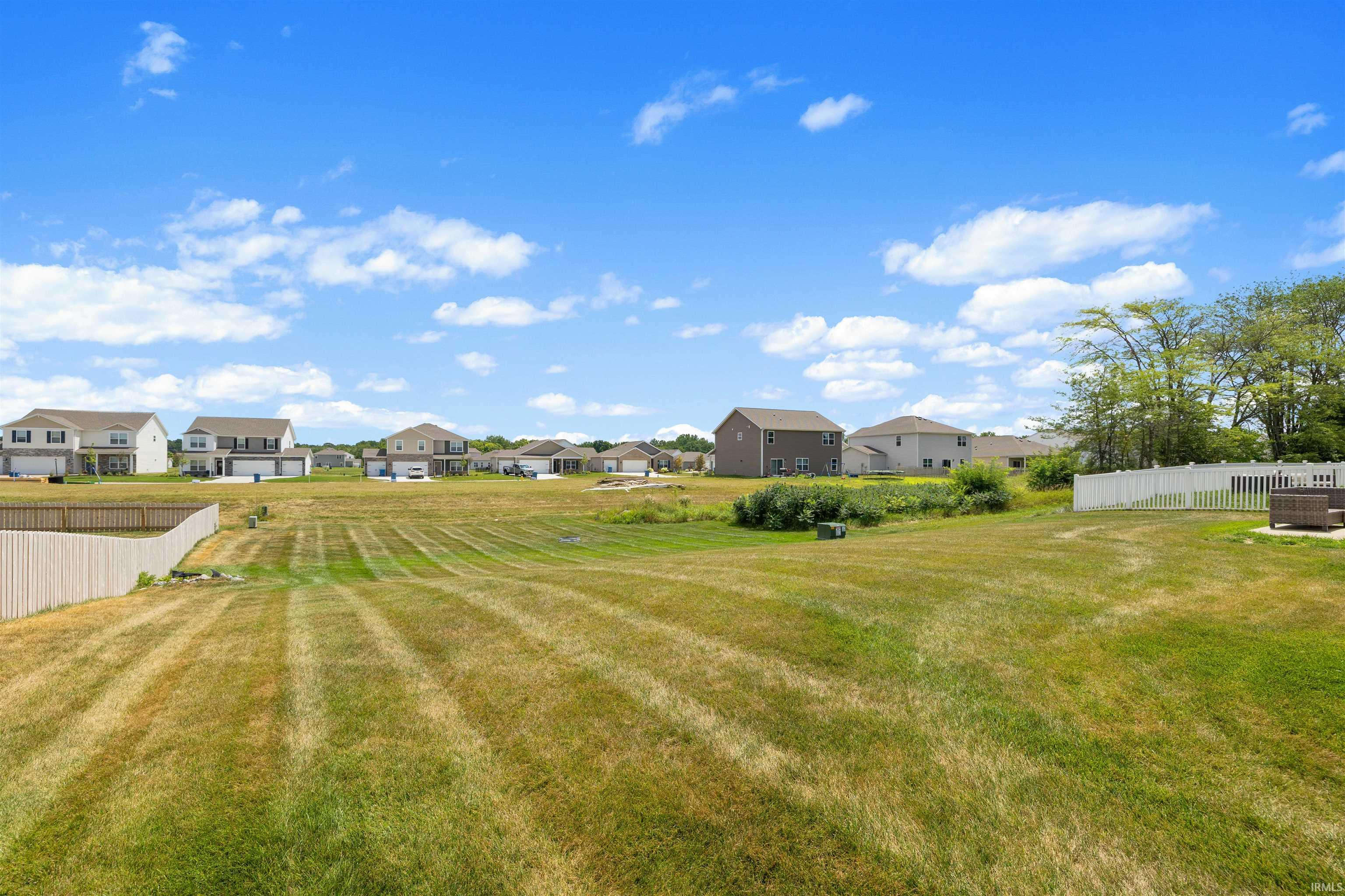 Expansive backyard with a large grassy area