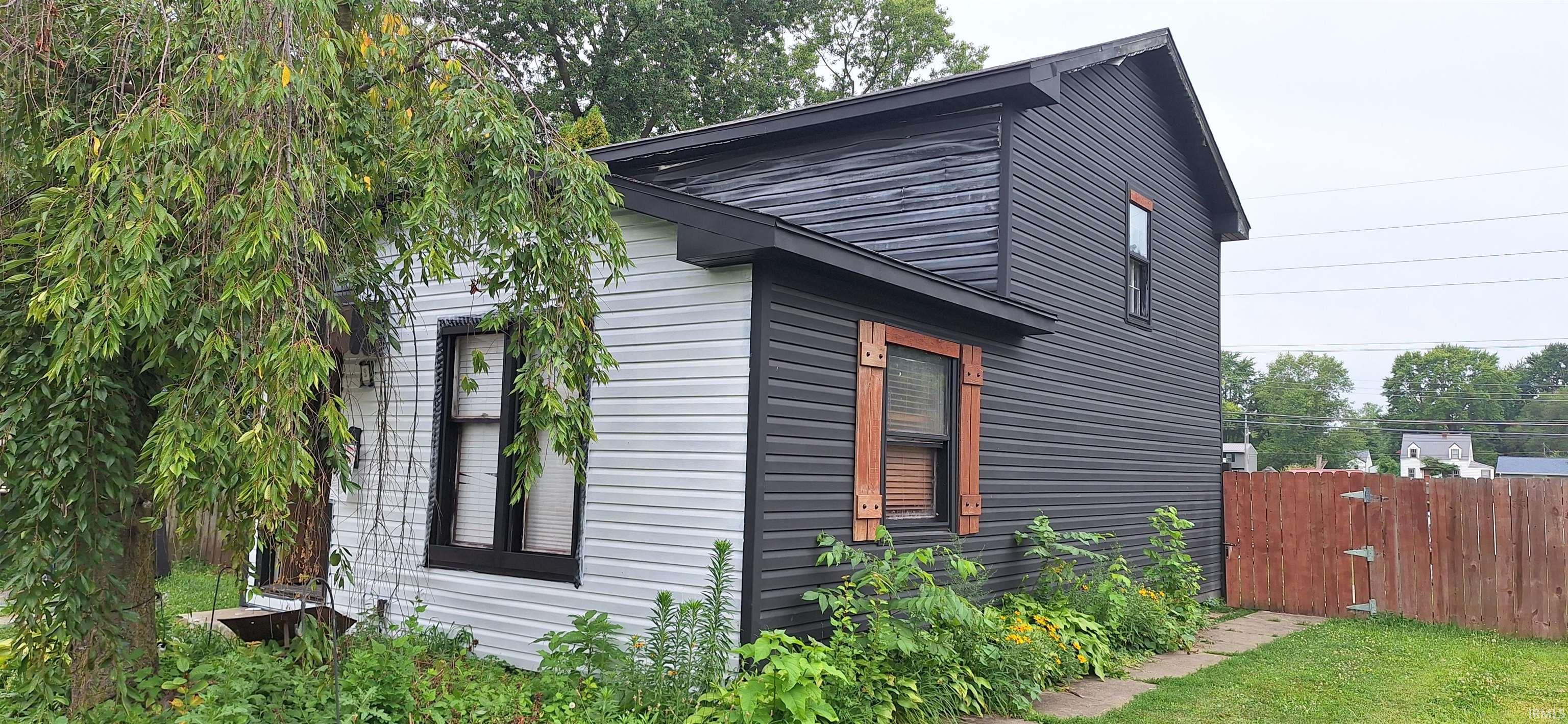 Two-tone exterior featuring light and dark siding