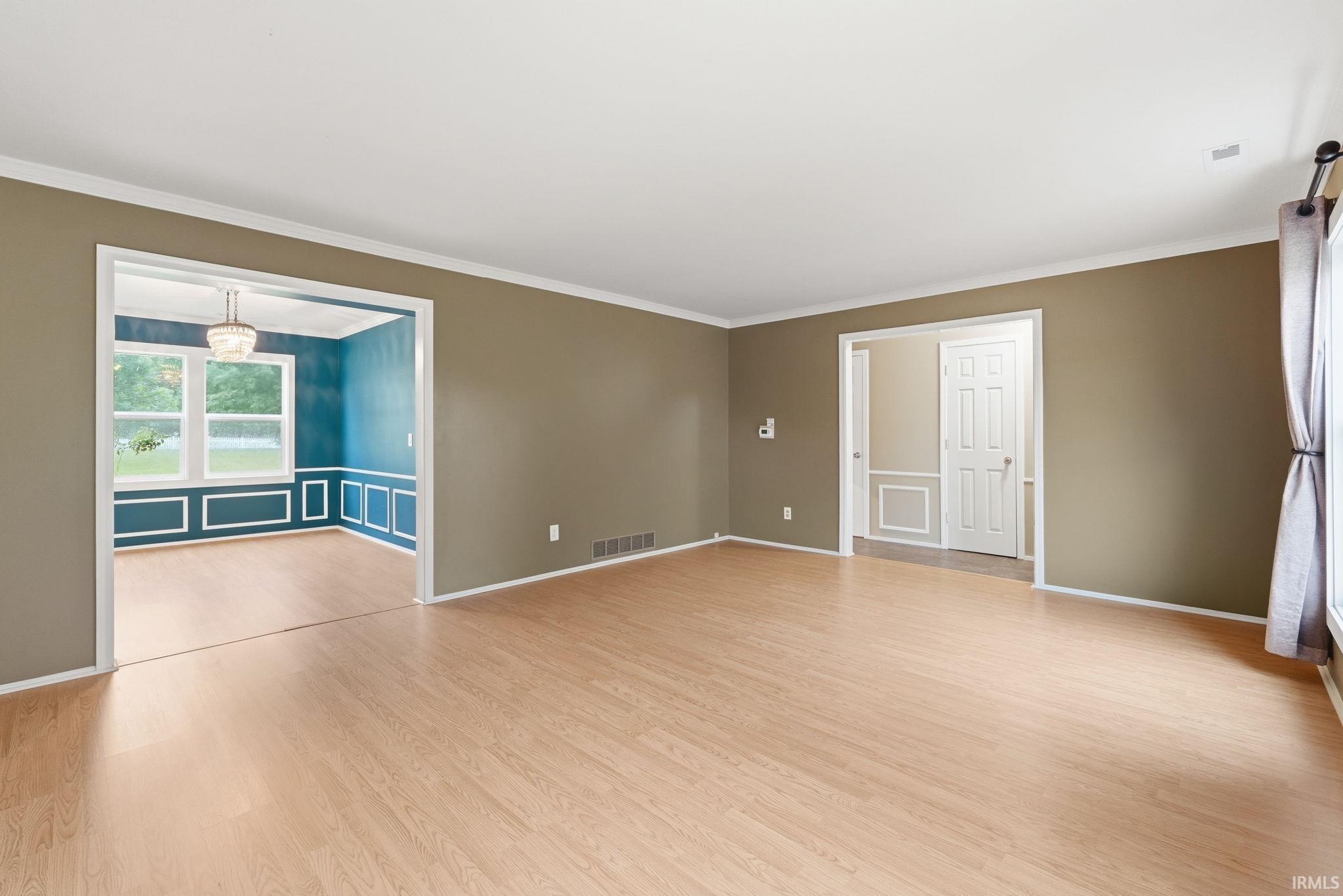 Hardwood-style flooring throughout