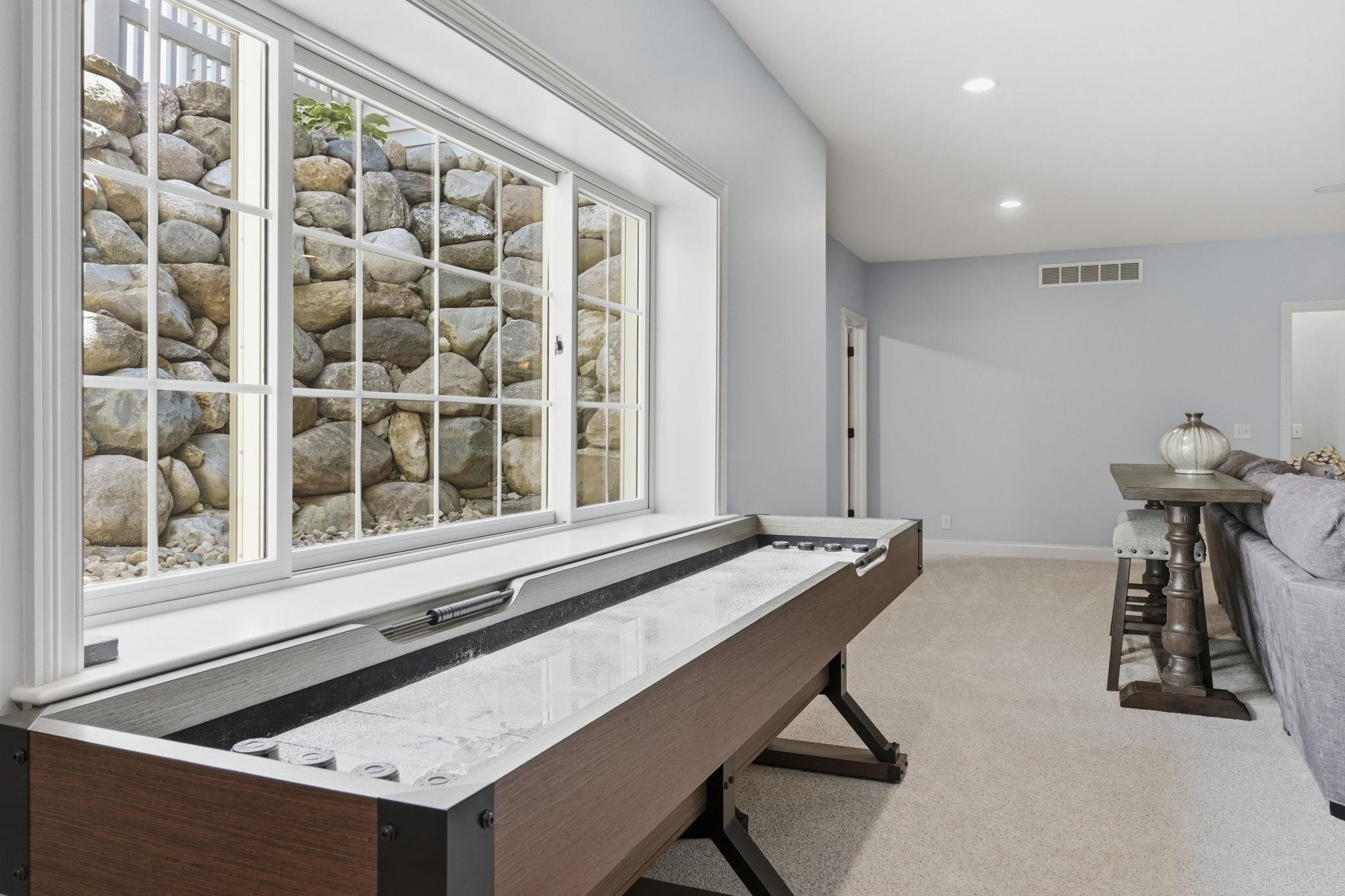 recently added custom rock wall and picture window for natural light