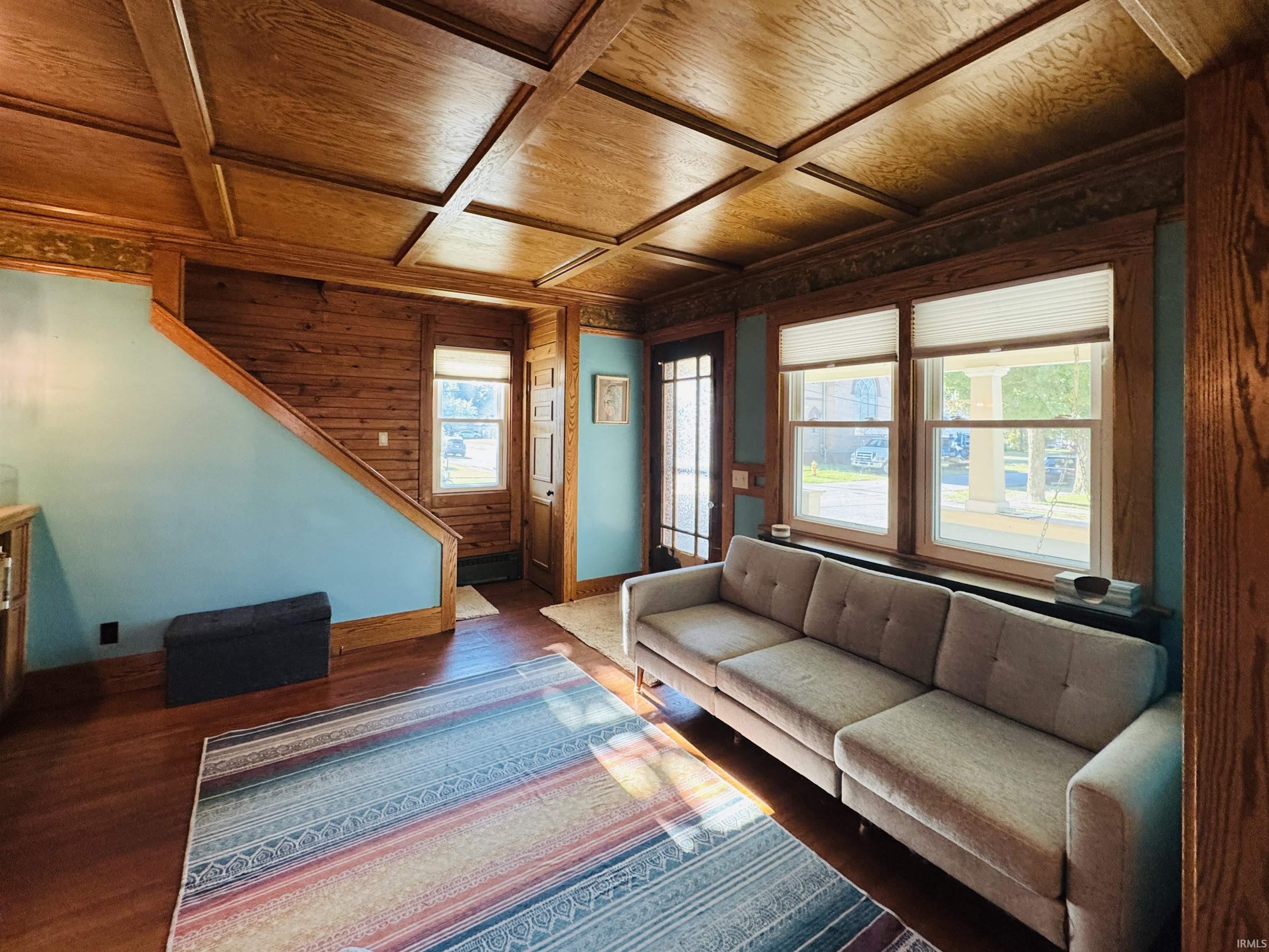 Coffered wood-finish ceiling with intricate detailing