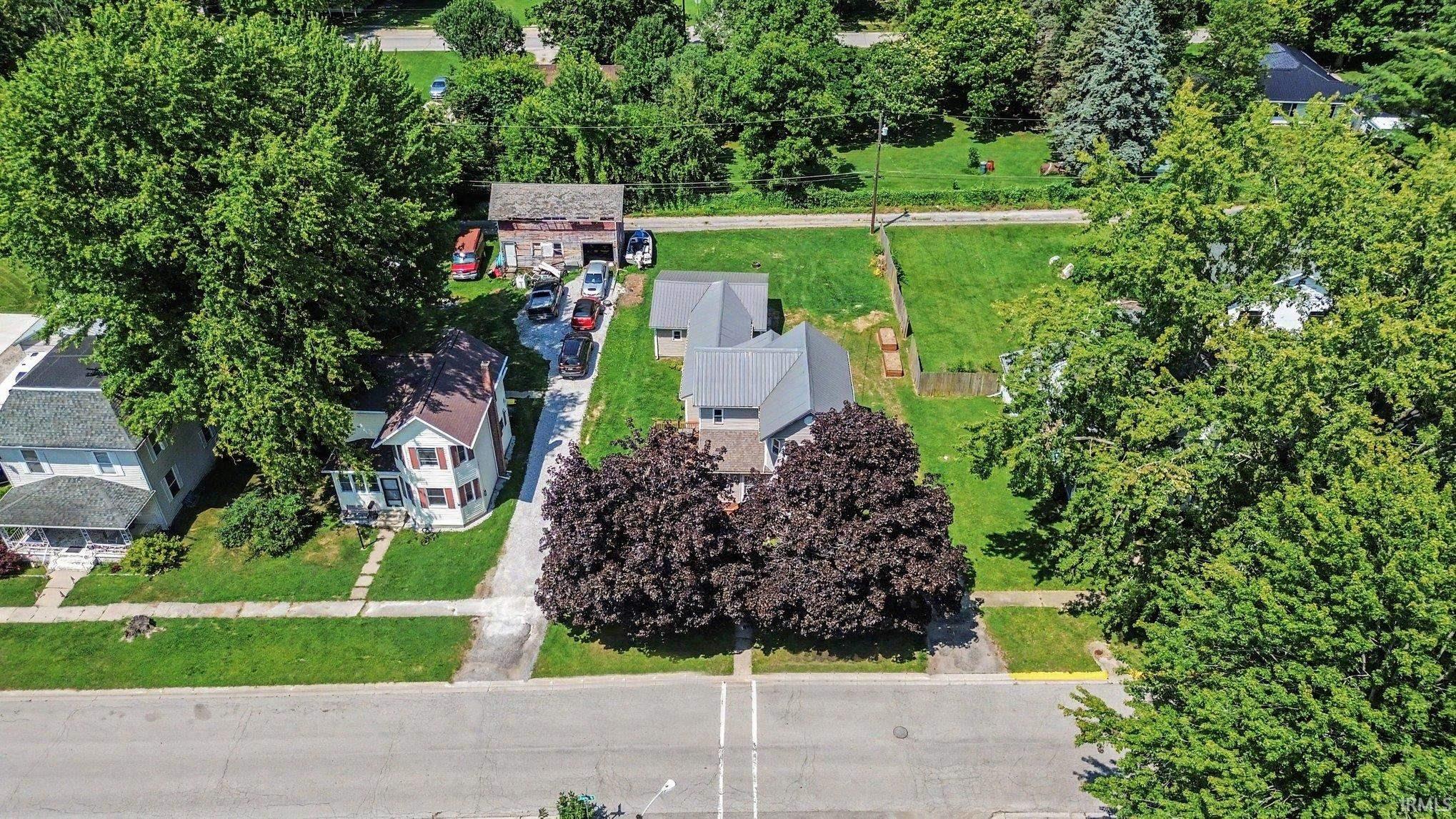 Aerial perspective showcasing multiple residential properties