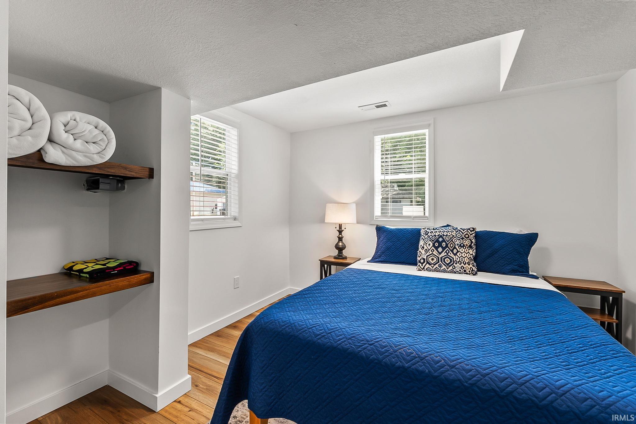 Wood-finish flooring with white walls
