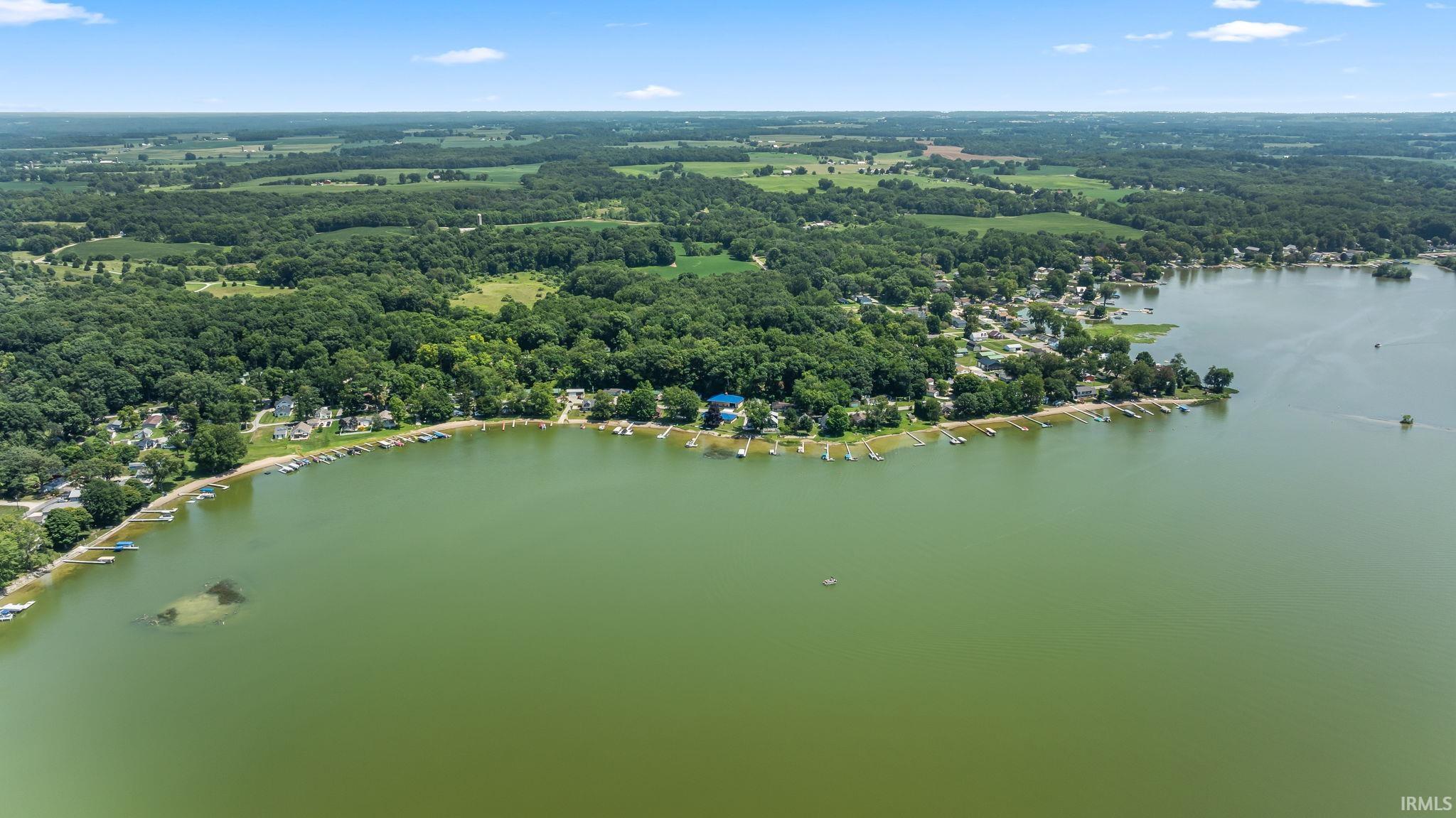 Lakefront properties with extensive surrounding woodlands and agricultural fields