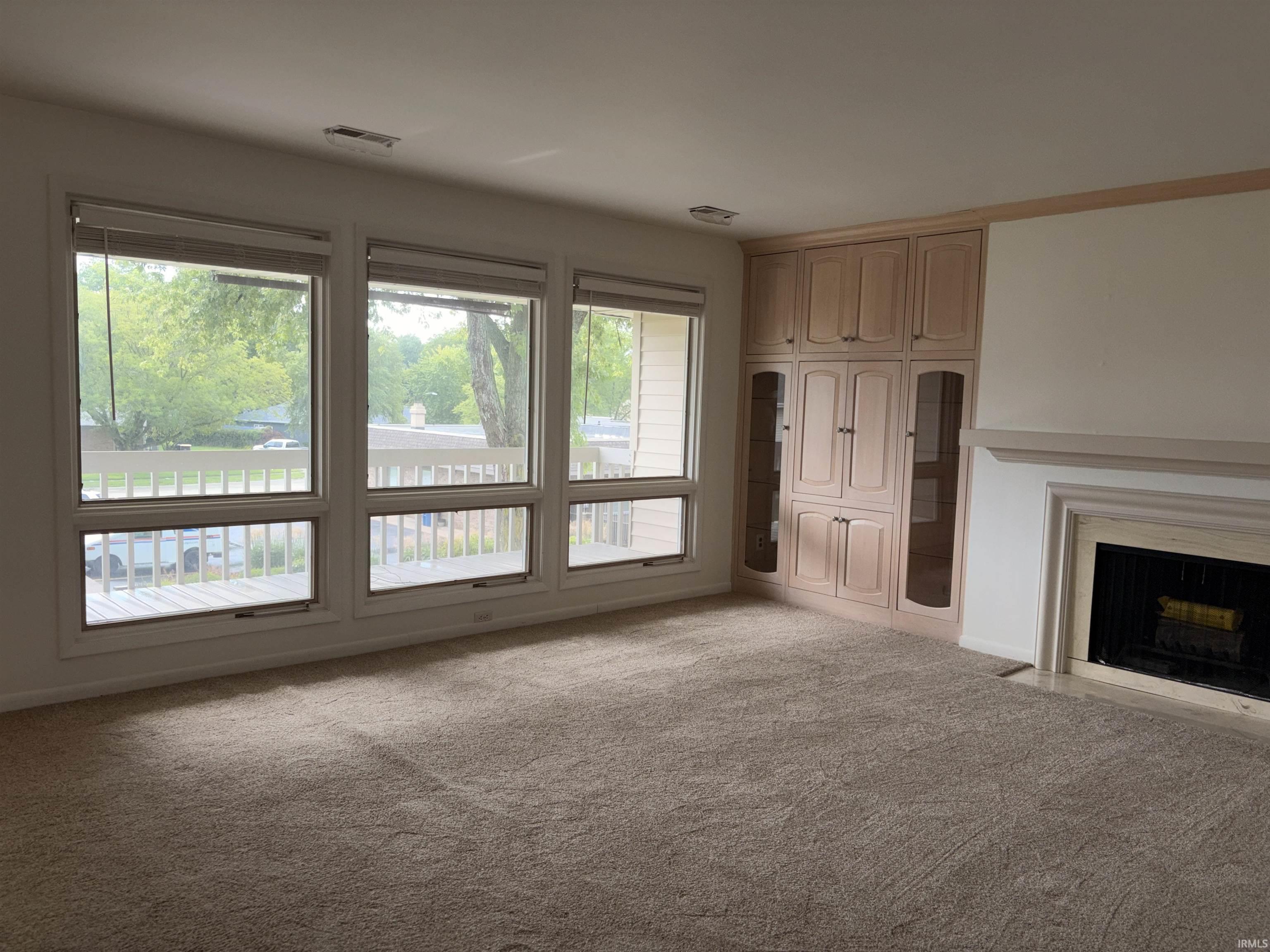 Built-in cabinetry with glass-front display areas