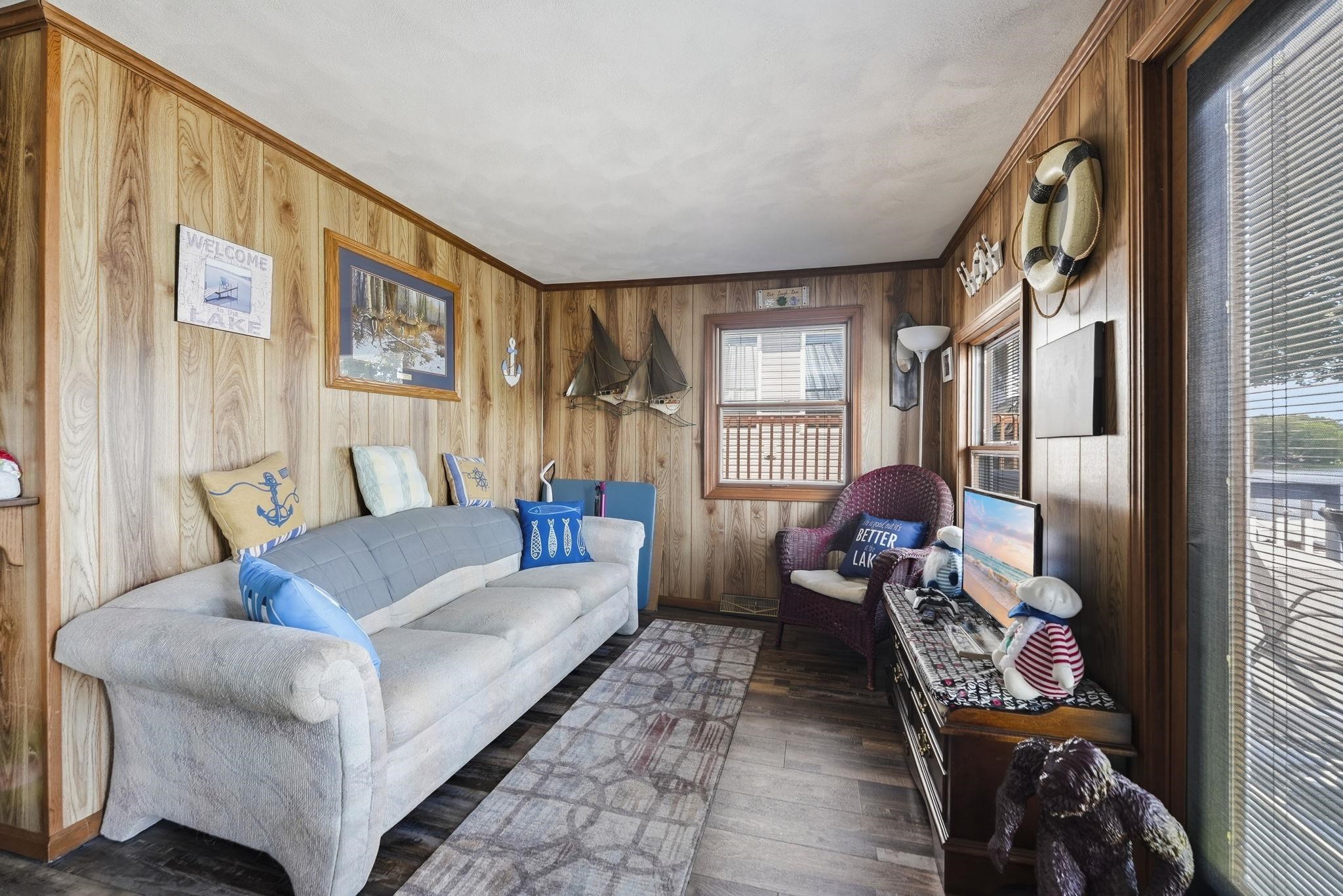 Wood-finish wall paneling, wood-finish flooring, and crown molding