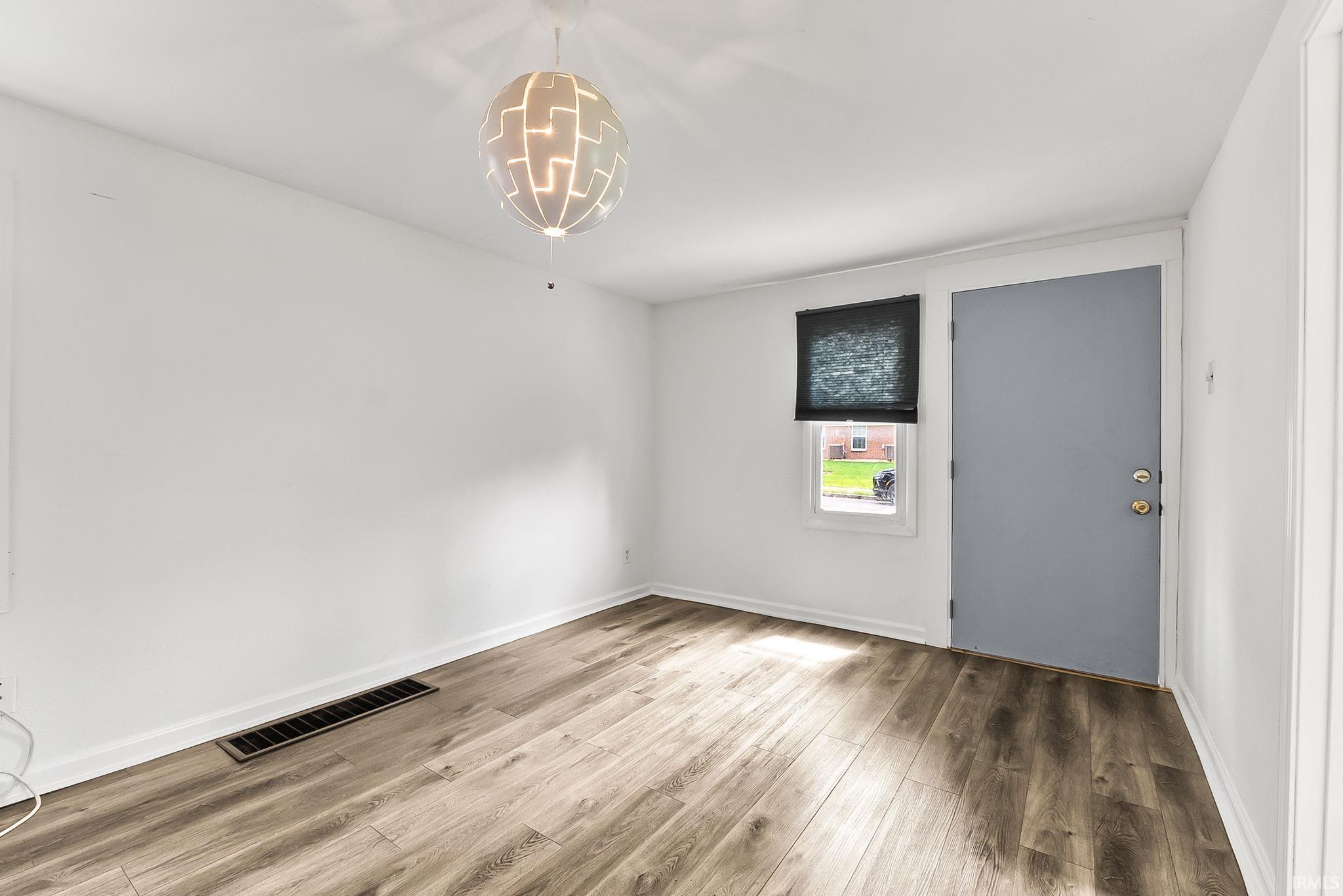 Wood-finish flooring with white walls