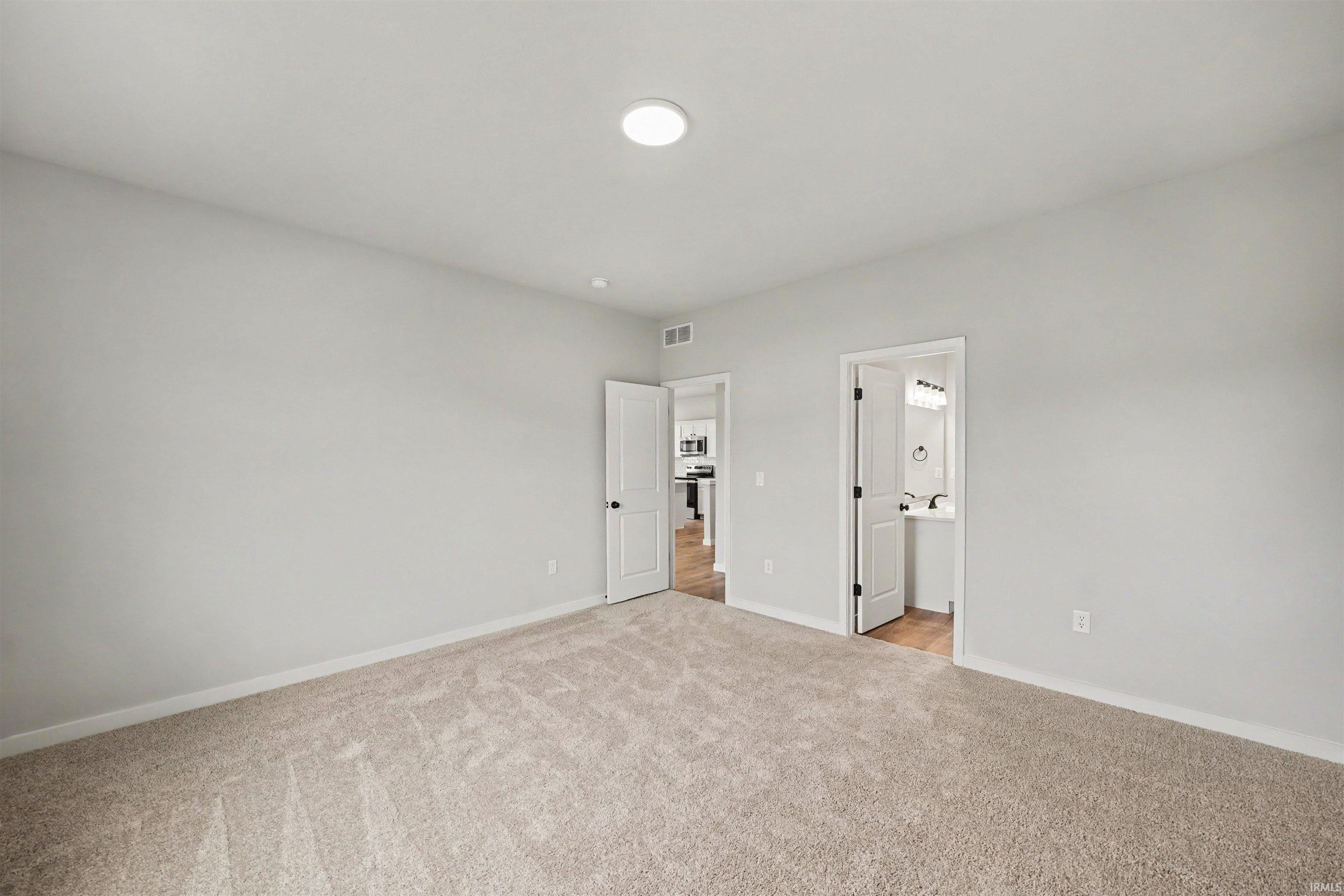 Stock Photo-Primary Bedroom