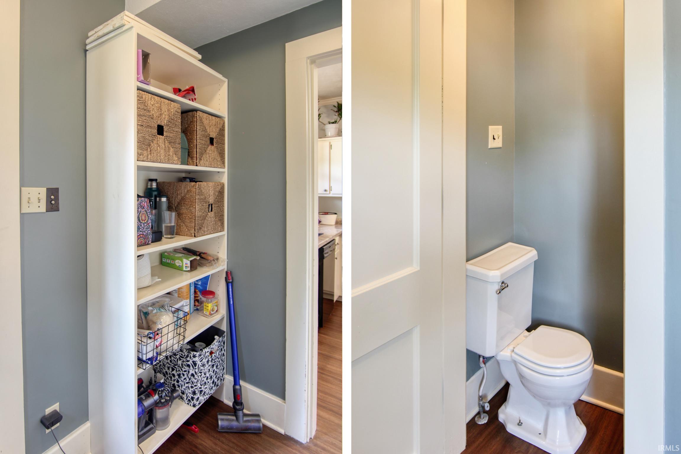 Built-in shelving with crown molding details, wood-finish flooring, and a white toilet fixture