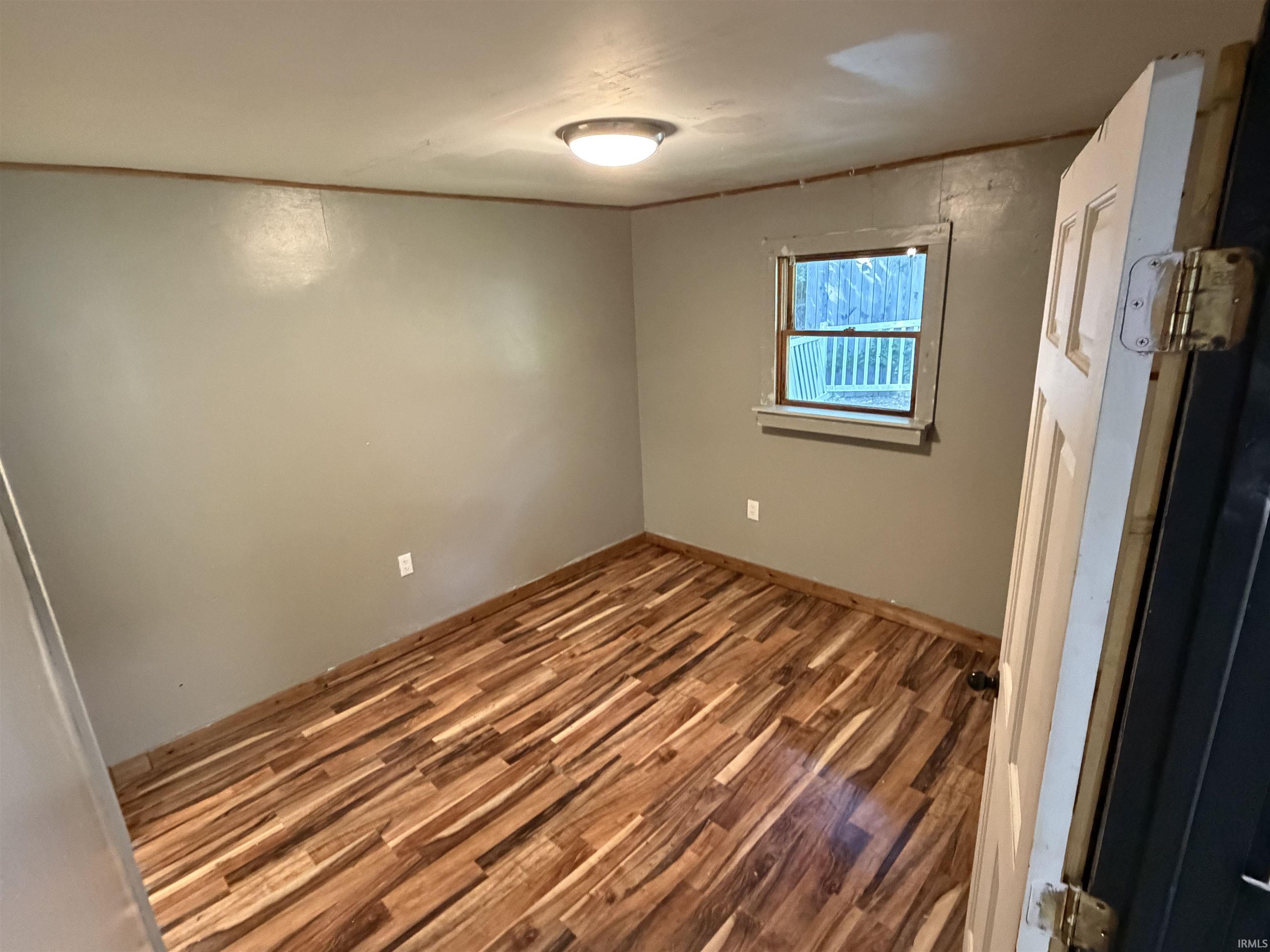 Wood-finish flooring with varied plank patterns