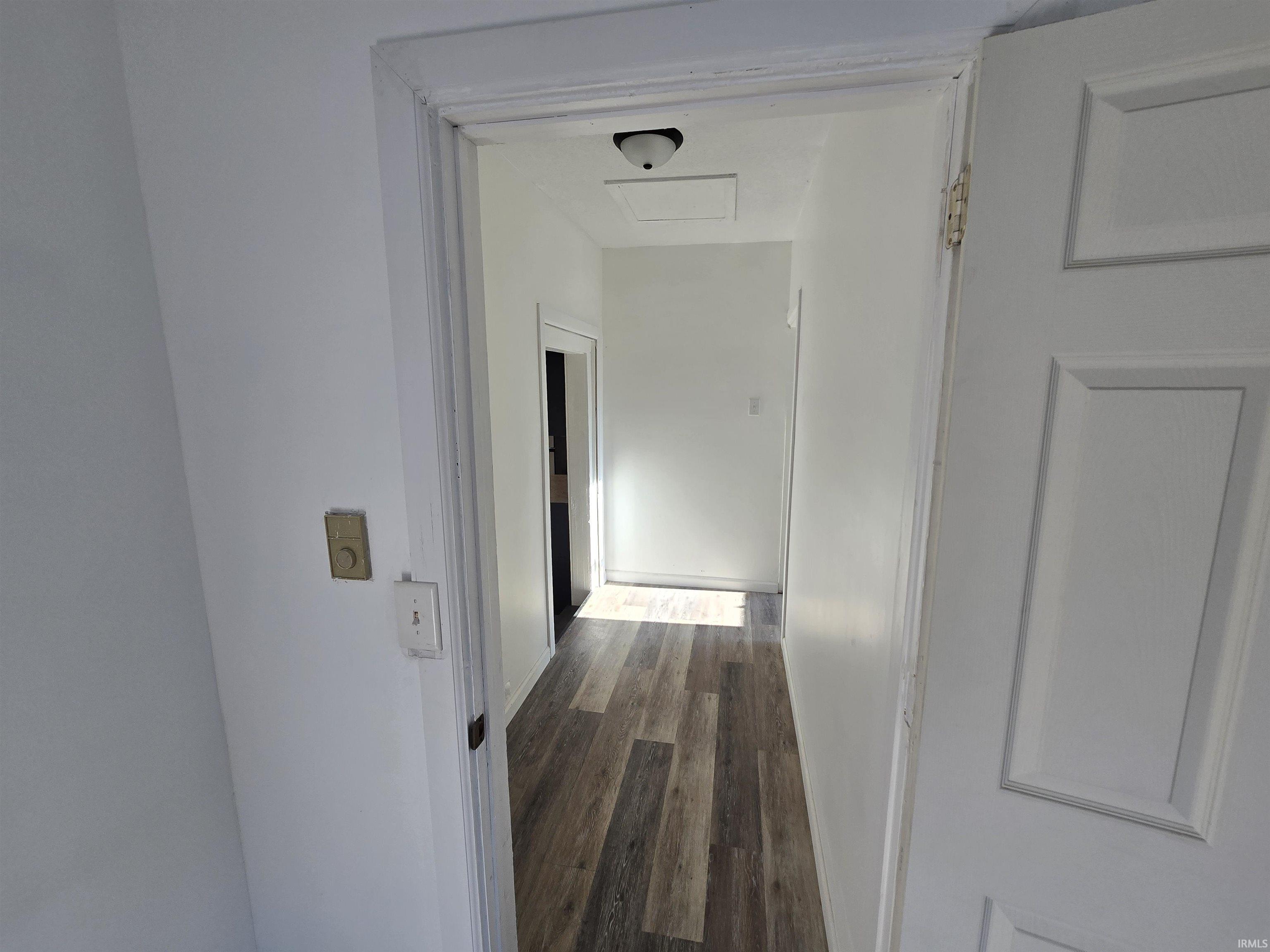 White paneled interior door
