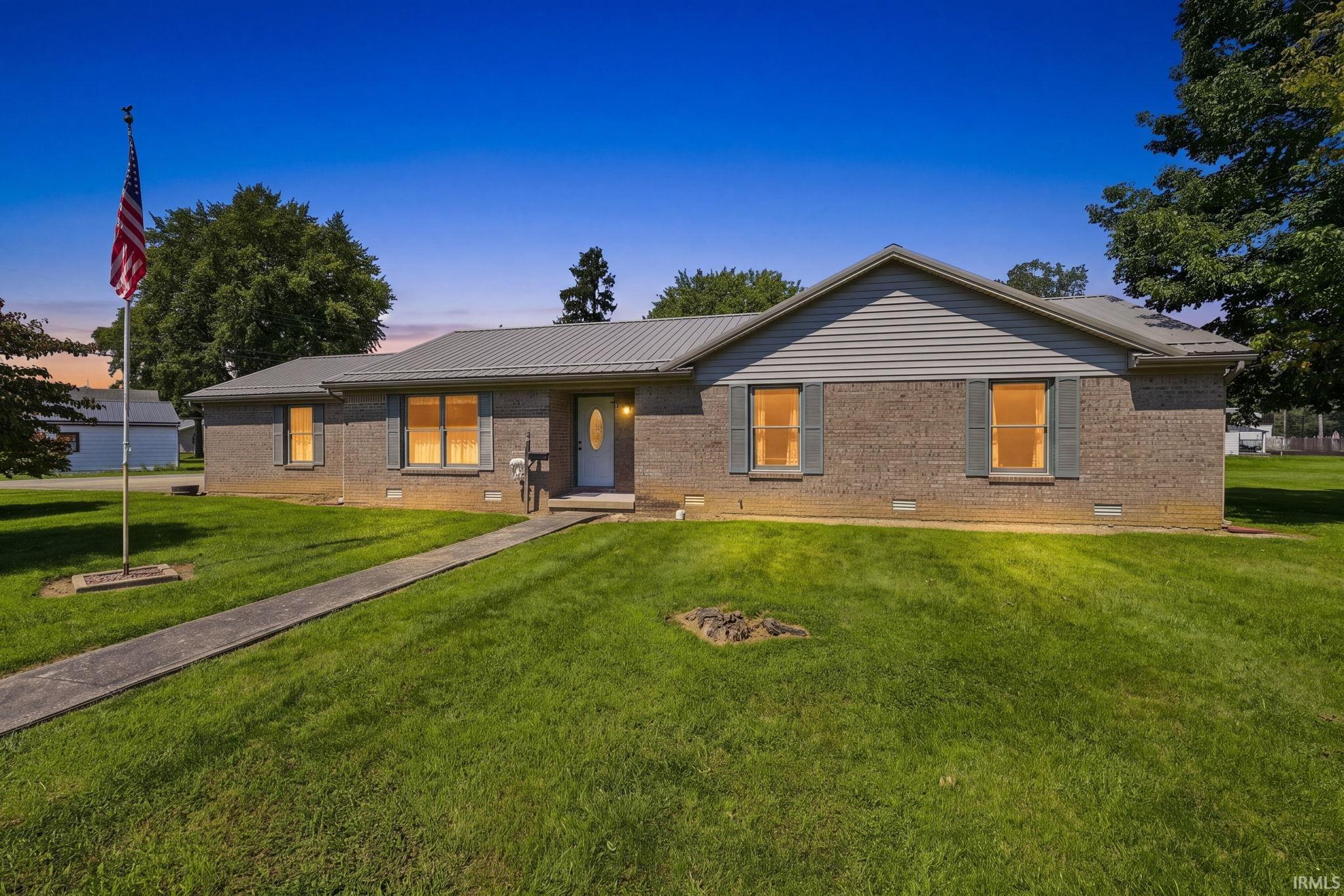 Brick exterior with a metal roof