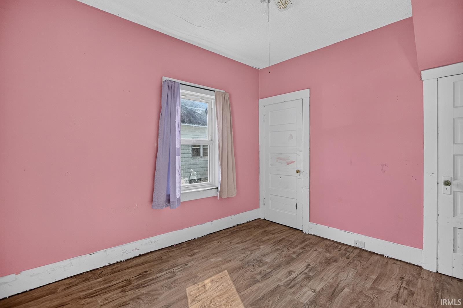 Vinyl Floor, two windows, clothes closet and storage closet