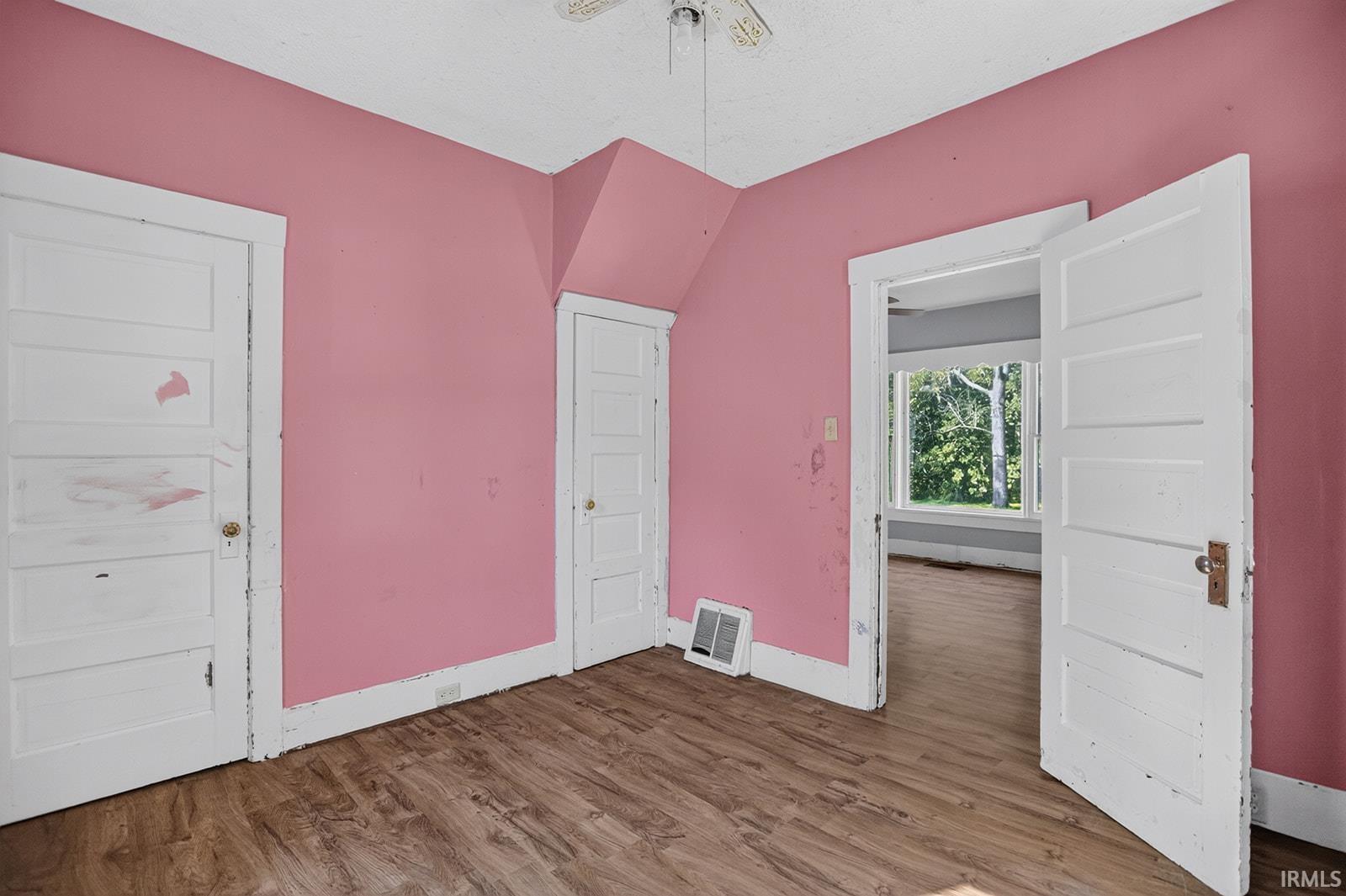 Vinyl Floor, two windows, clothes closet and storage closet