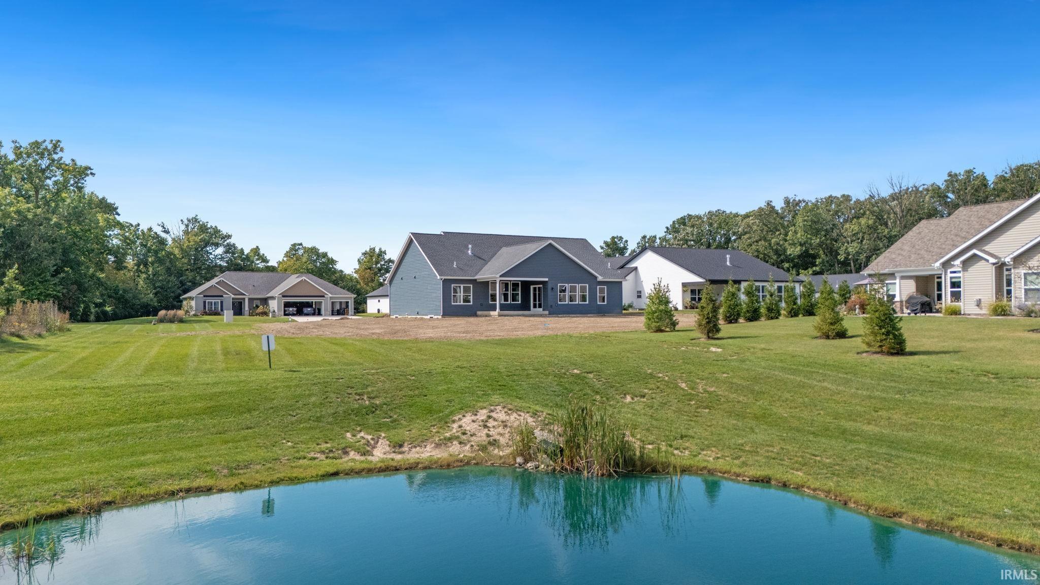 Pond lot with community owned nature preserve next door!