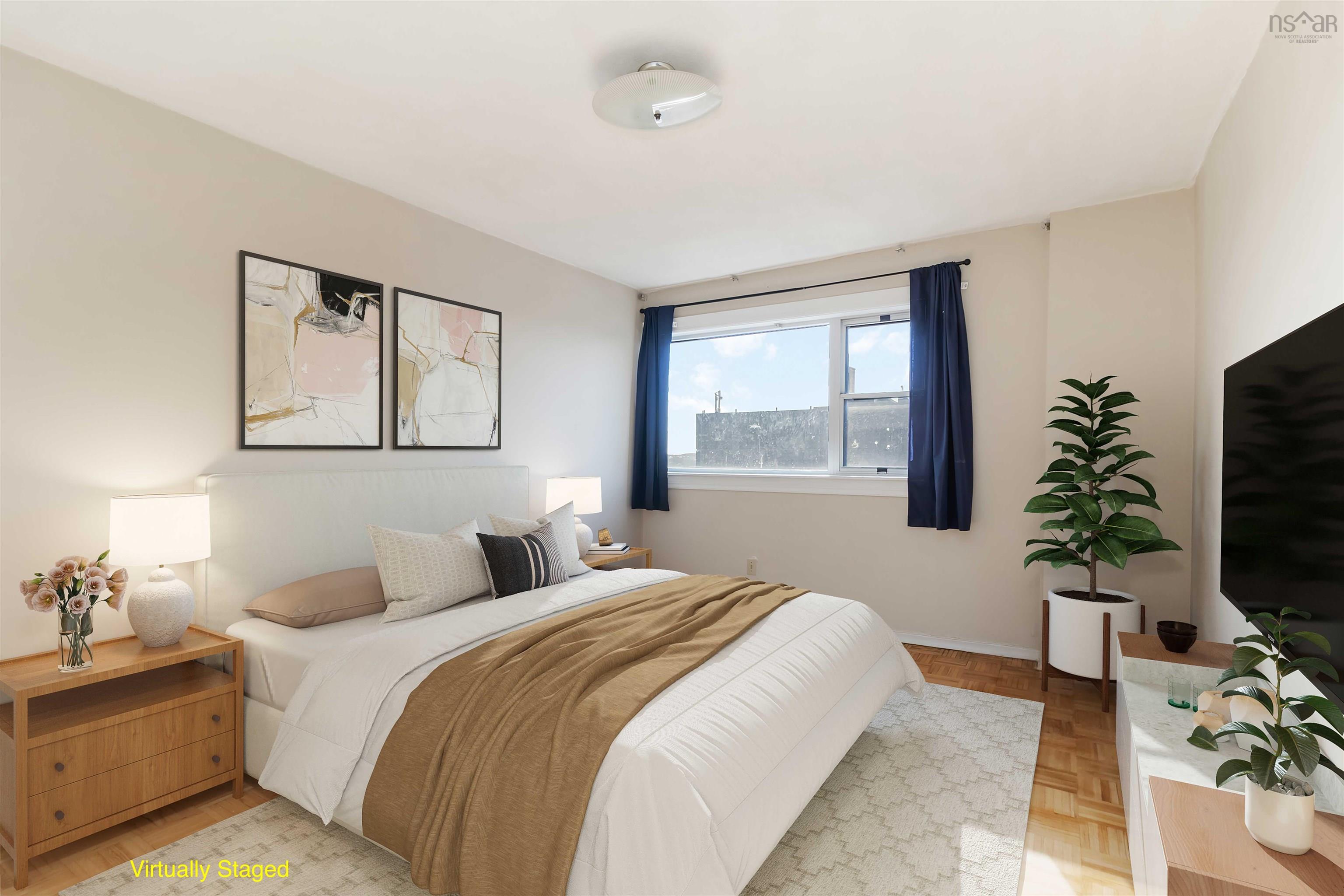 1601 5959 Spring Garden Road, Halifax, NS (MLS® 202620845) — Hardwood-style flooring, white walls, and a large window with white trim