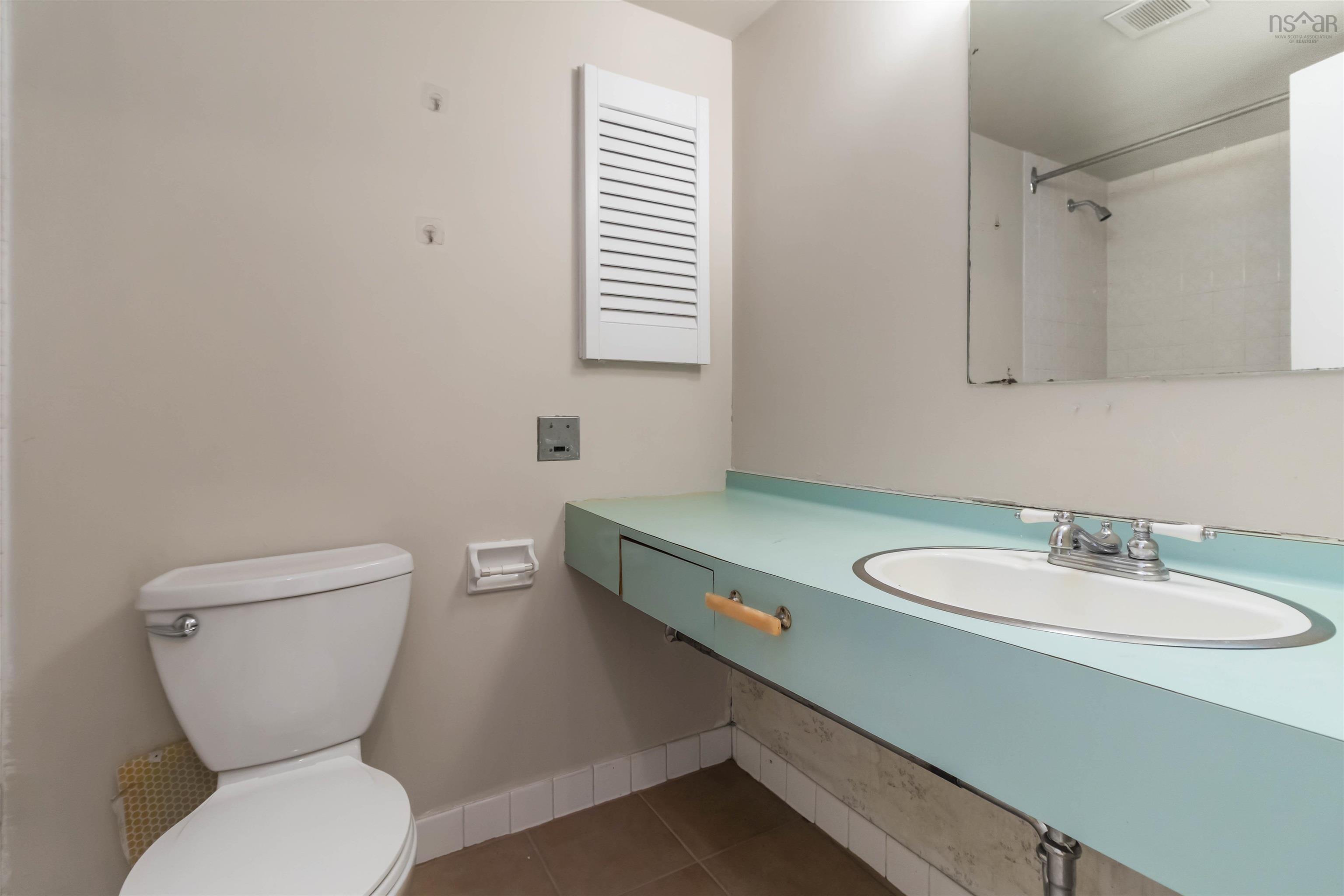 1601 5959 Spring Garden Road, Halifax, NS (MLS® 202620845) — Wall-mounted floating vanity with an integrated sink and chrome faucet