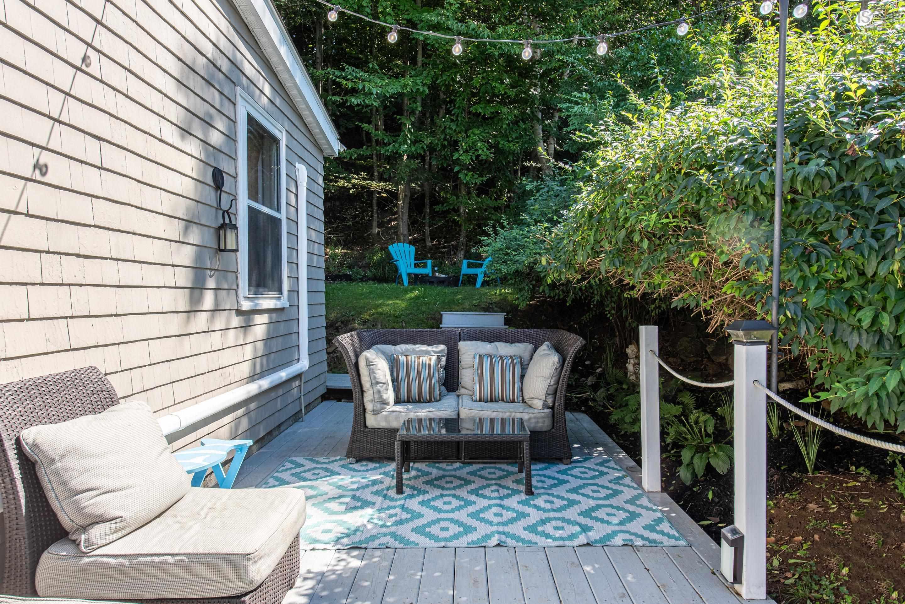 1237 Purcells Cove Road, Halifax, NS (MLS® 202622232) — Wood-finish deck with string lighting