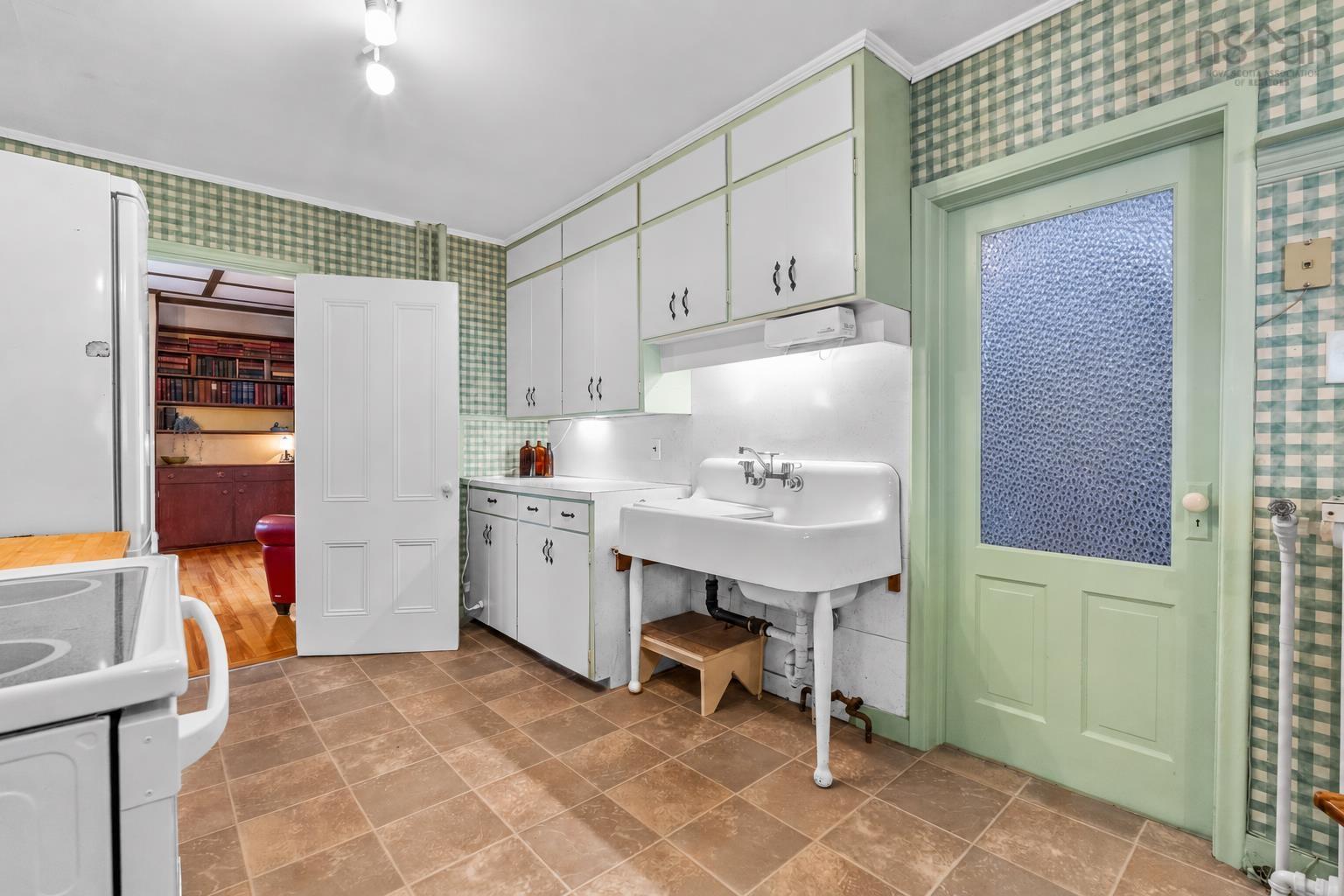 28 Arlington Place, Truro, NS (MLS® 202623012) — Just off the kitchen, you’ll find an impressive 8' × 8' walk-in pantry offering plenty of additional storage.