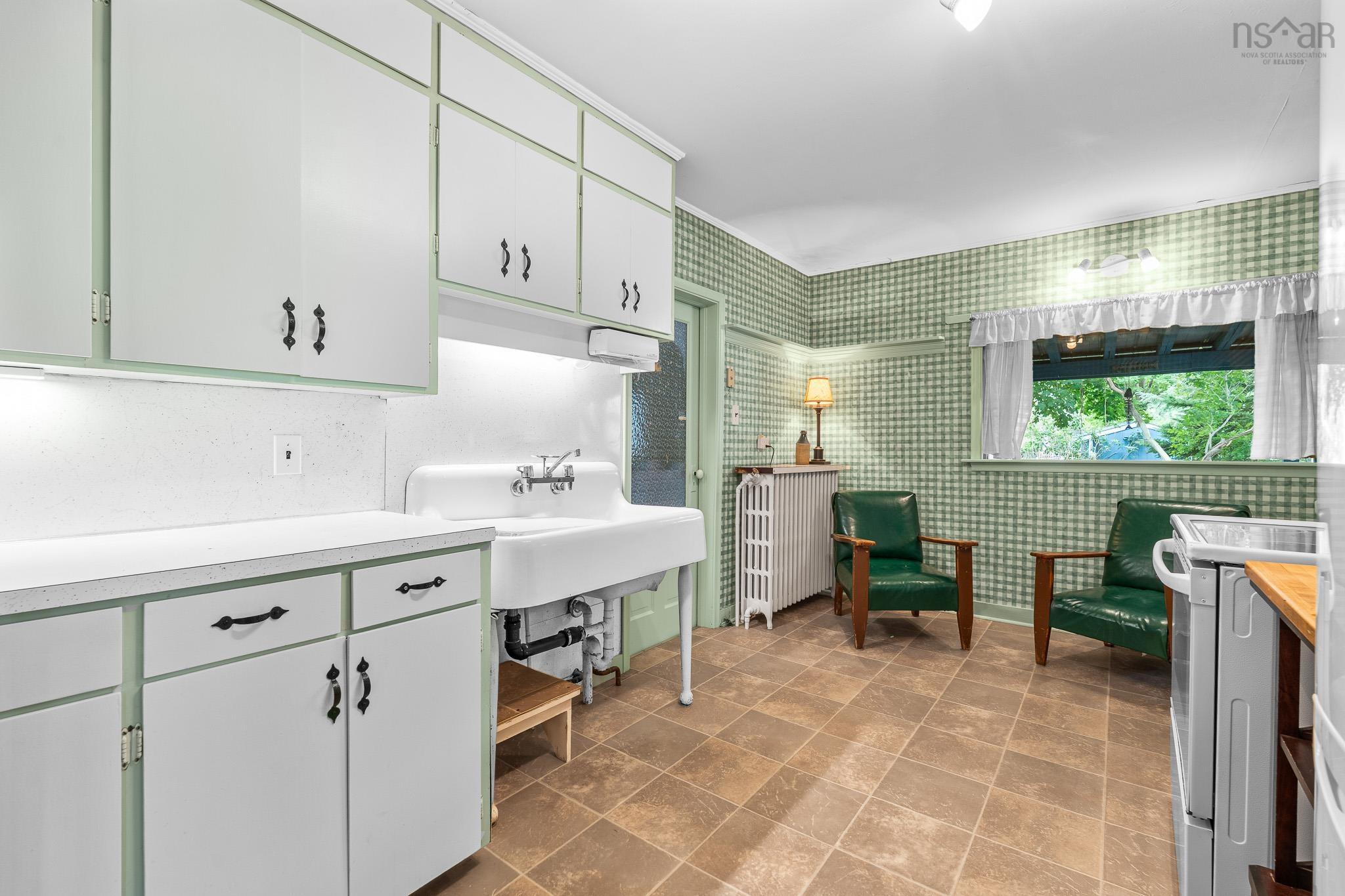 28 Arlington Place, Truro, NS (MLS® 202623012) — A charming country-style kitchen with a pantry, generous workspace and room to pull up a chair and enjoy a morning coffee.