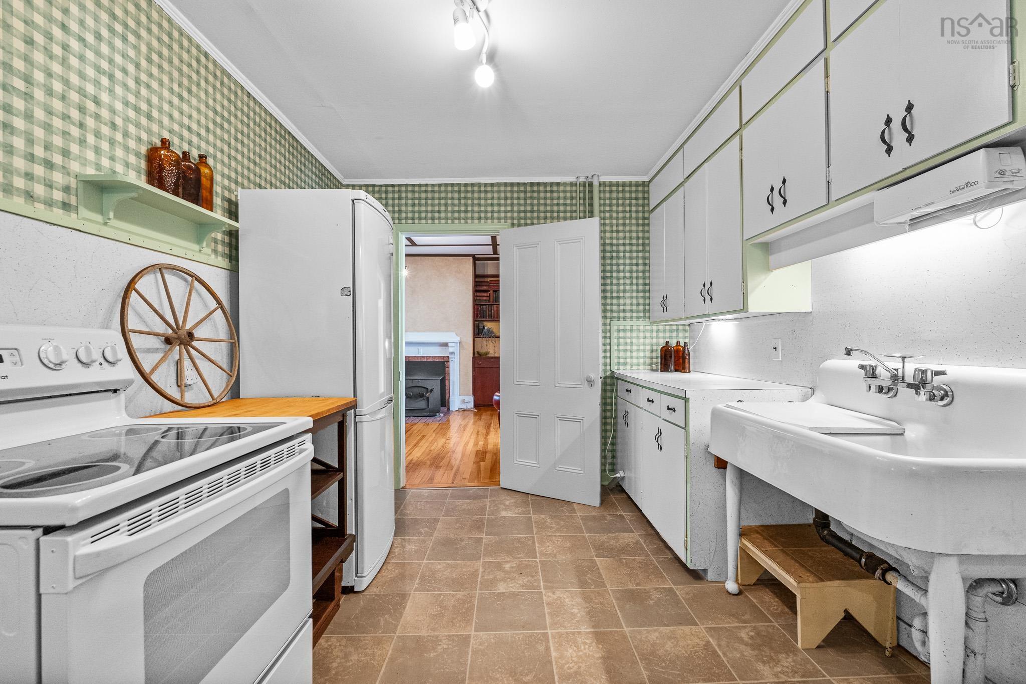 28 Arlington Place, Truro, NS (MLS® 202623012) — The kitchen flows naturally into the family room, making it easy to stay connected while cooking, entertaining or enjoying everyday life.