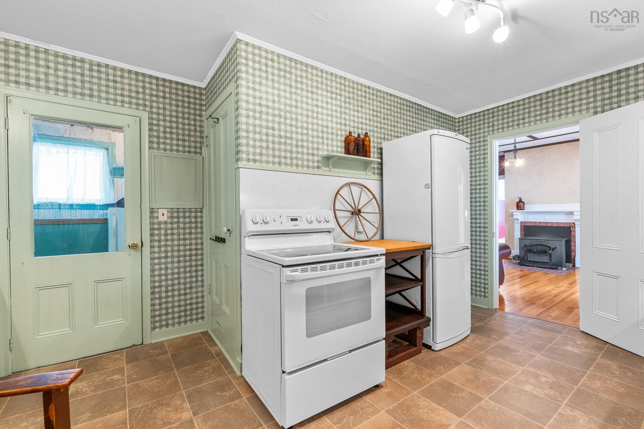 28 Arlington Place, Truro, NS (MLS® 202623012) — The back door opens to a convenient rear foyer, providing access to the covered veranda and additional storage room.