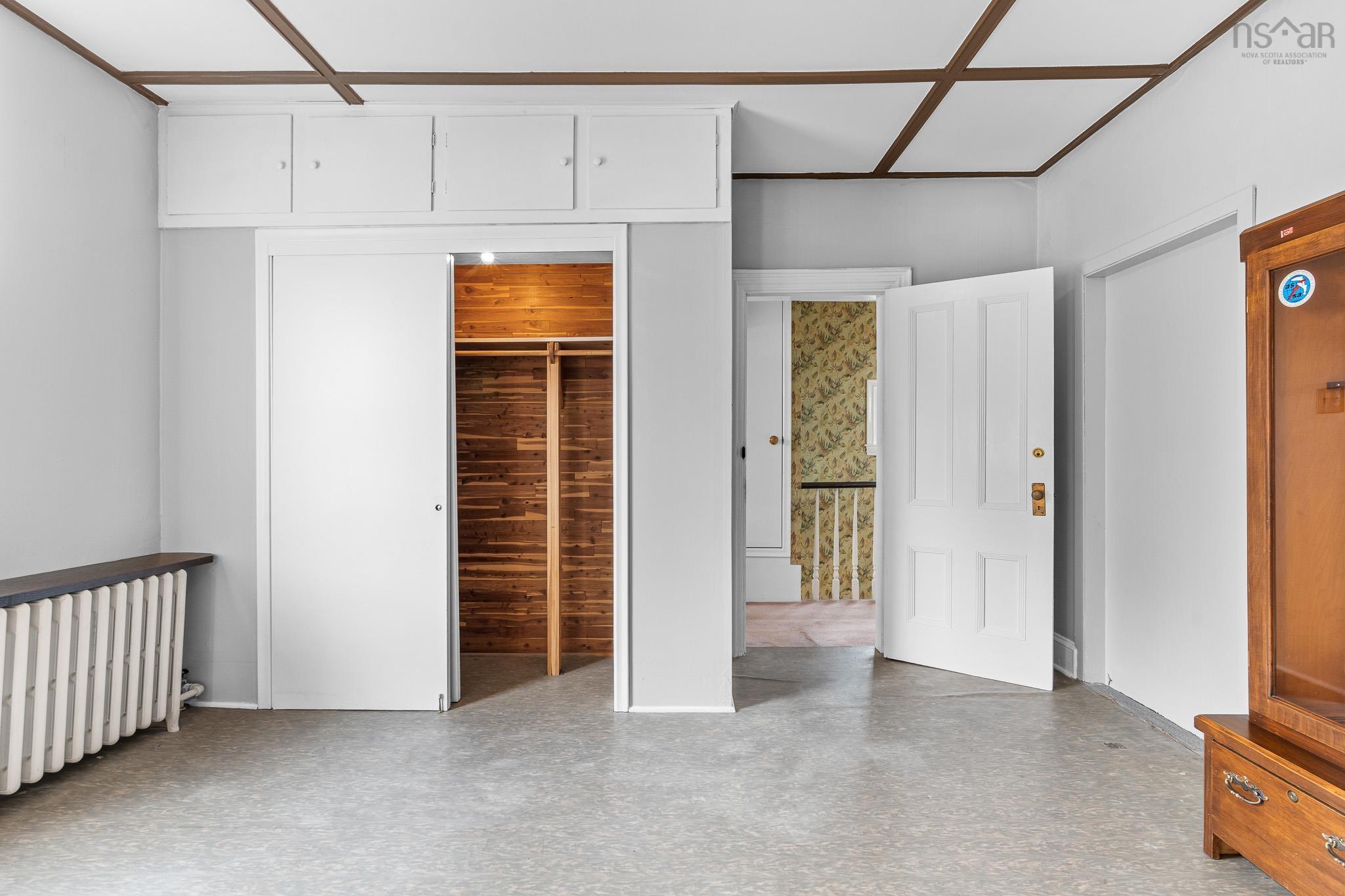 28 Arlington Place, Truro, NS (MLS® 202623012) — Even the closets have character! Pine-lined interiors provide practical storage while preserving another lovely detail of this home's history.