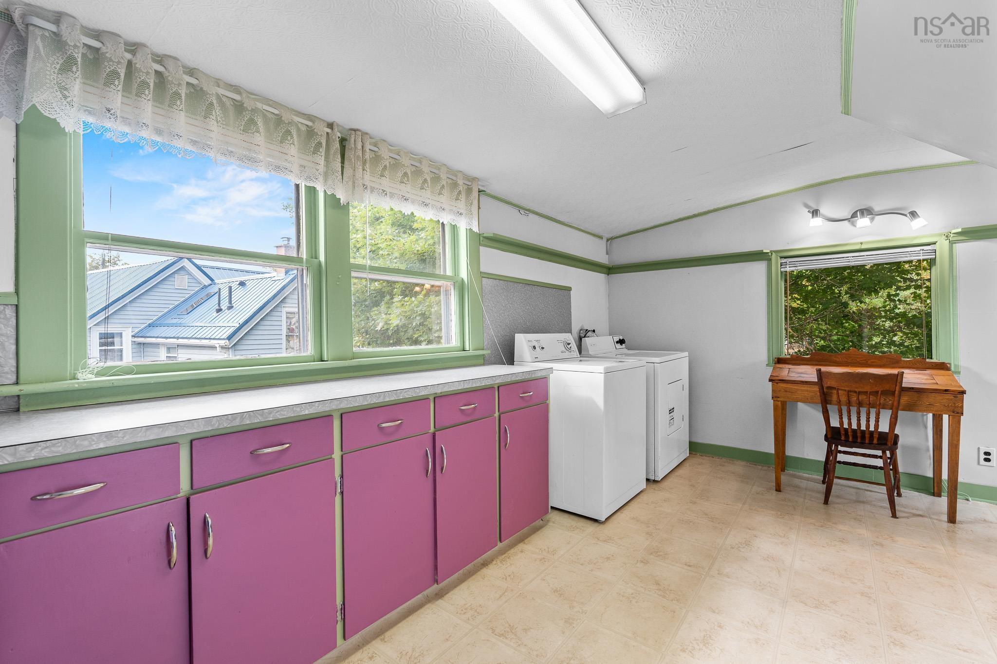 28 Arlington Place, Truro, NS (MLS® 202623012) — this spacious bonus room offers endless possibilities. Imagine a bright playroom, craft or hobby room, home office, or creative space, with plenty of built-in storage and room to spread out.