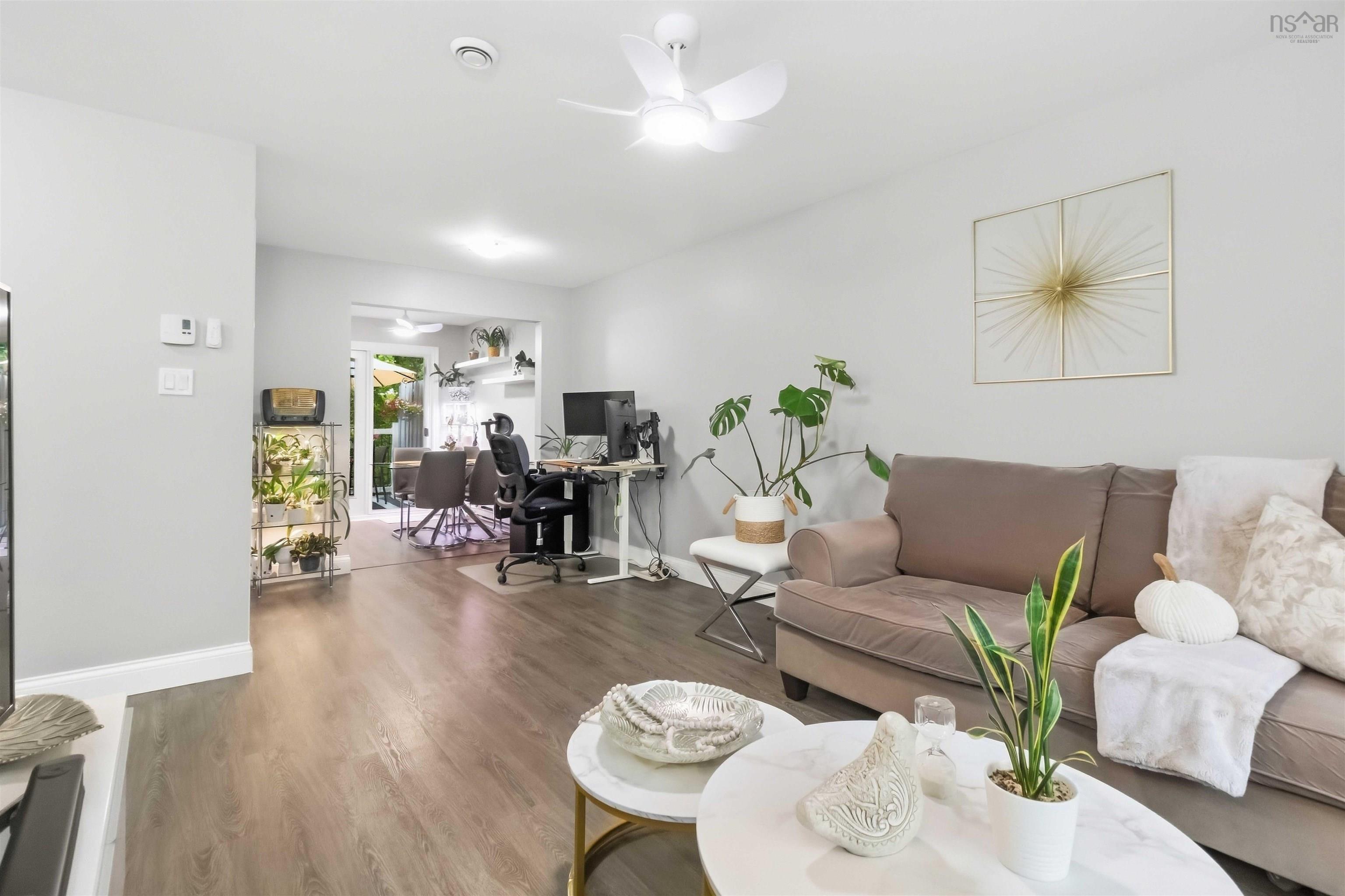 34 Lindsay Court, Lower Sackville, NS (MLS® 202624063) — Wood-finish flooring, white ceiling fan, recessed lighting, and bright white baseboards