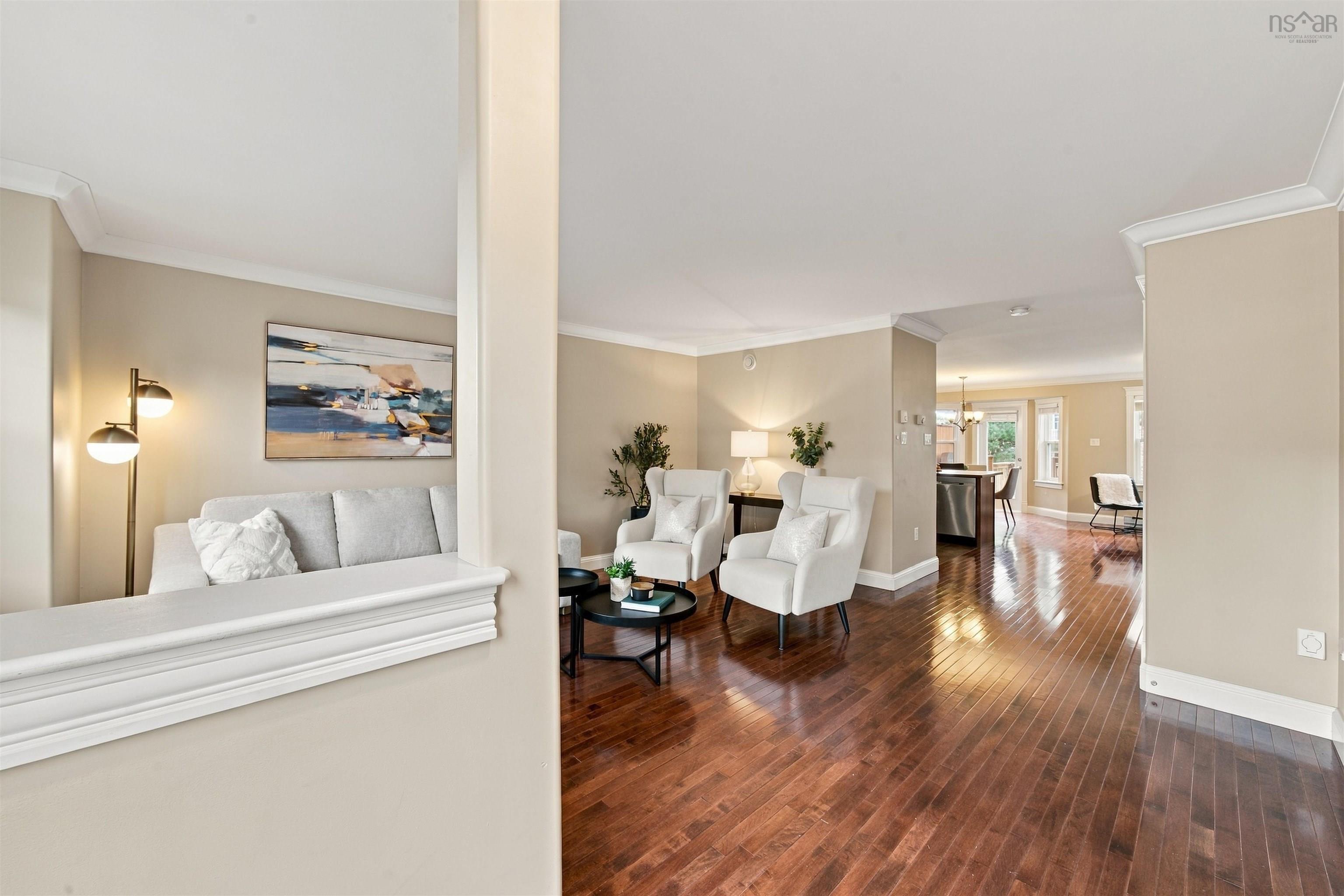 150 Transom Drive, Halifax, NS (MLS® 202625460) — Rich wood-finish flooring, crown molding, and neutral wall tones