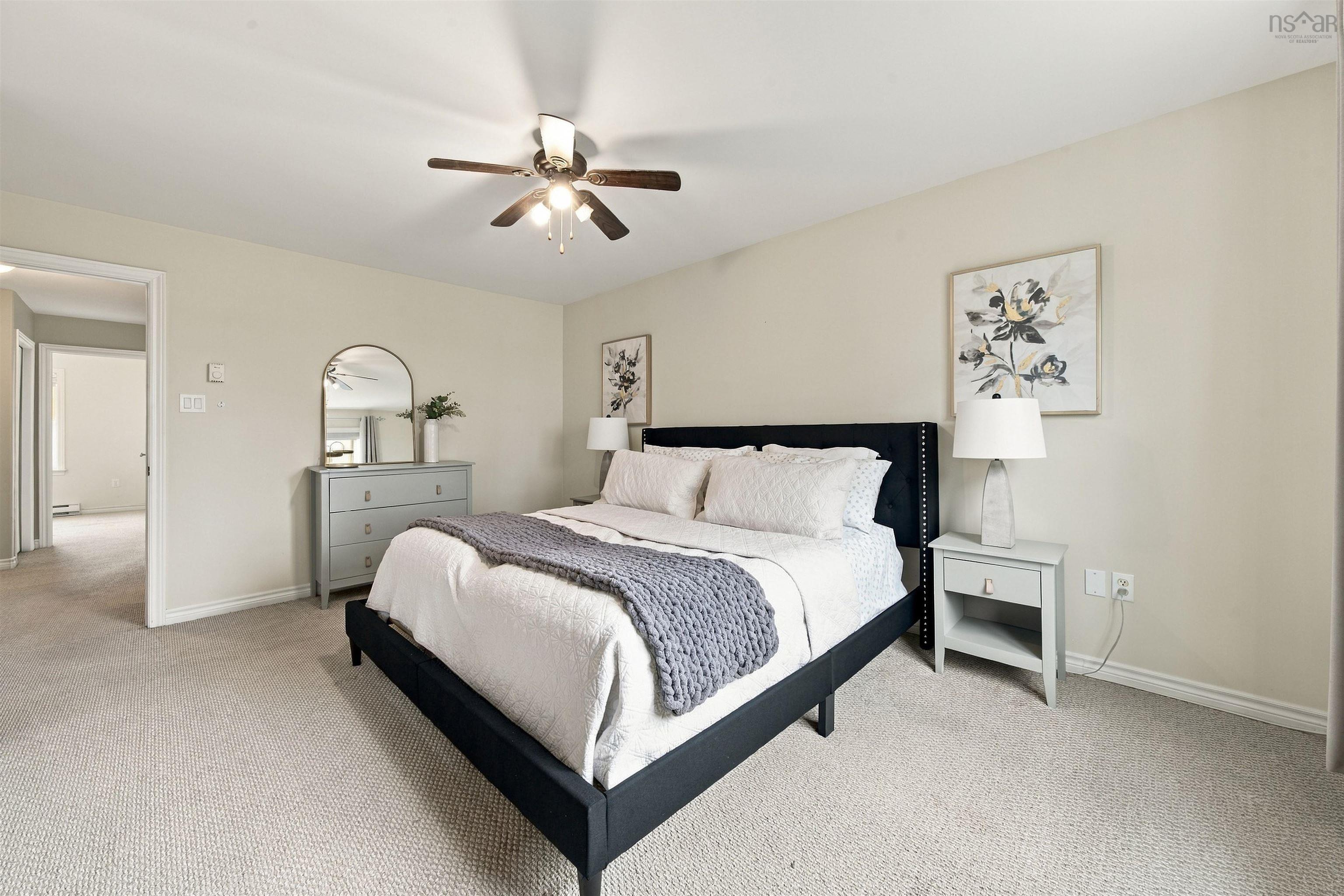 150 Transom Drive, Halifax, NS (MLS® 202625460) — Neutral-toned carpet flooring, light-colored walls, and a ceiling fan with integrated lighting