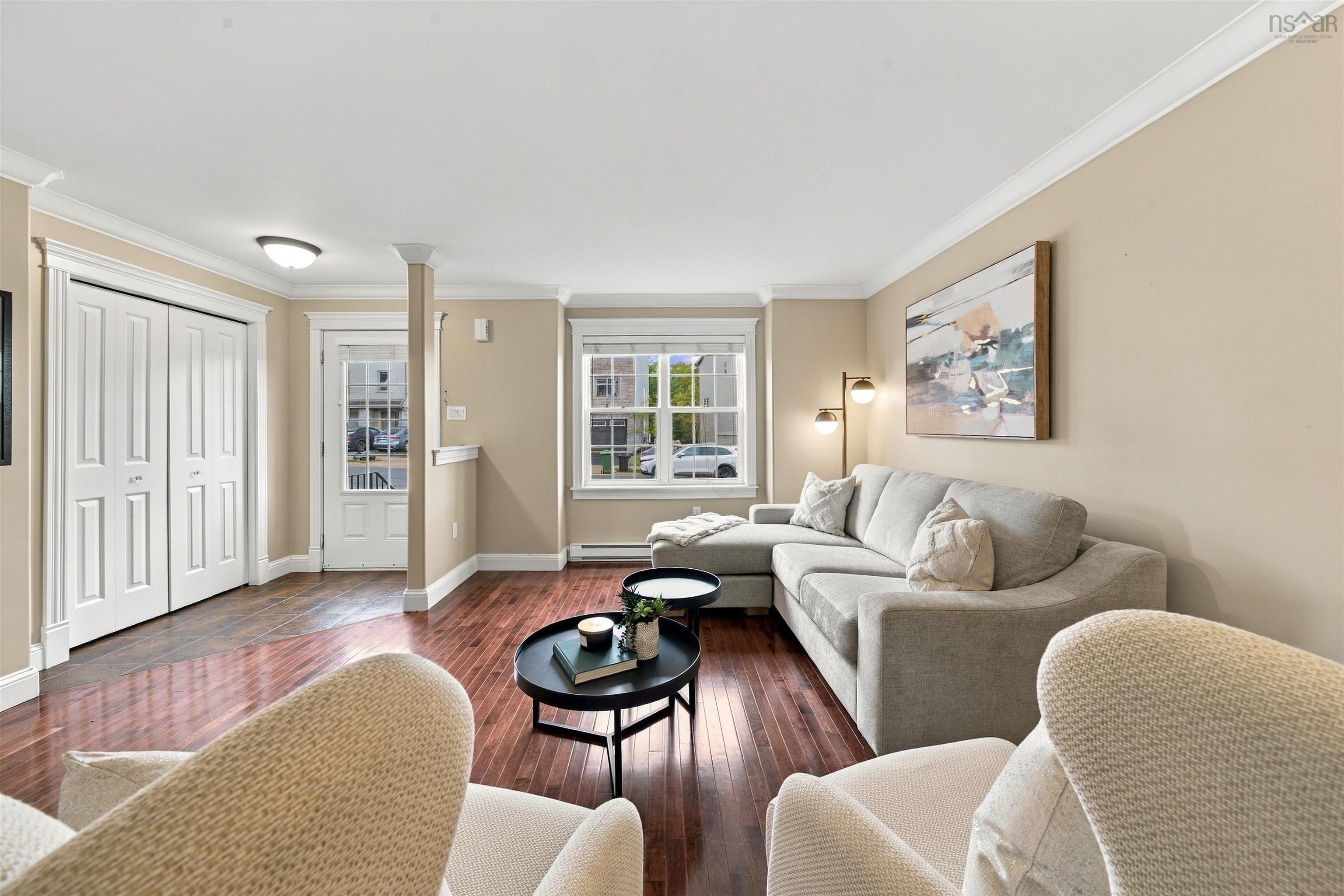 150 Transom Drive, Halifax, NS (MLS® 202625460) — Wood-finish flooring, crown molding, double-hung windows, and white trim throughout