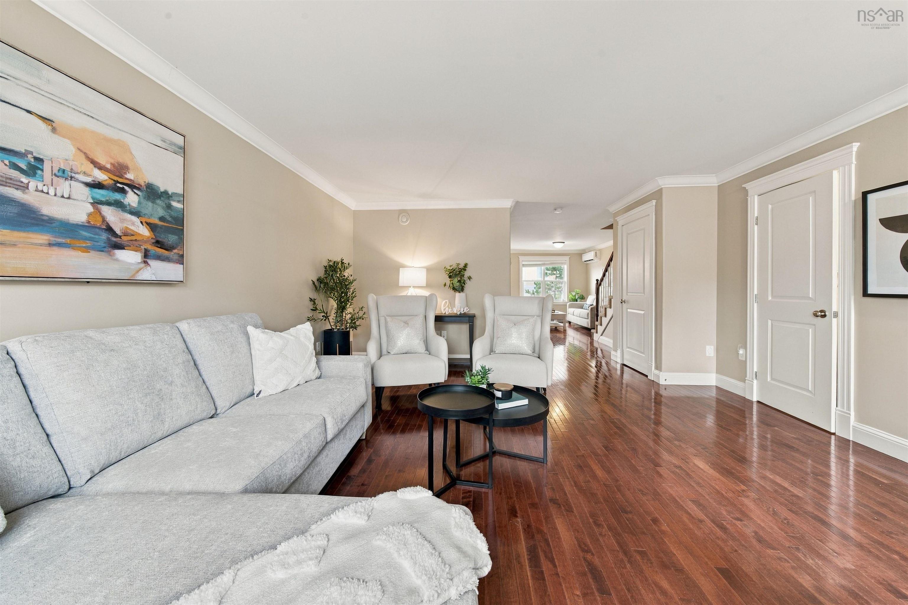 150 Transom Drive, Halifax, NS (MLS® 202625460) — Rich wood-finish flooring, crown molding, and neutral wall tones