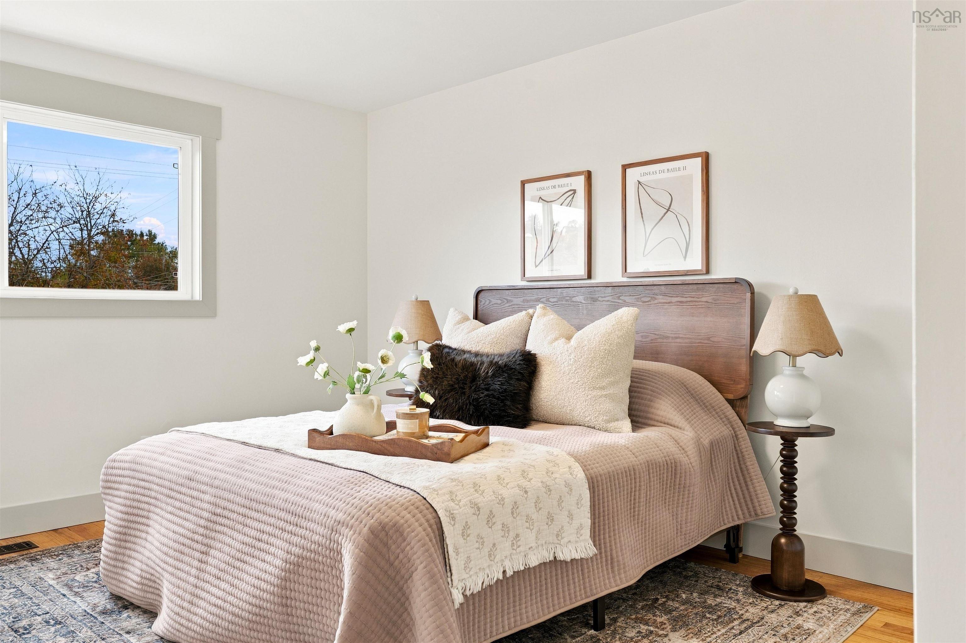 74 1/2 Belle Vista Drive, Dartmouth, NS (MLS® 202625912) — Interior space featuring white walls, wood-finish flooring, and a window with neutral trim