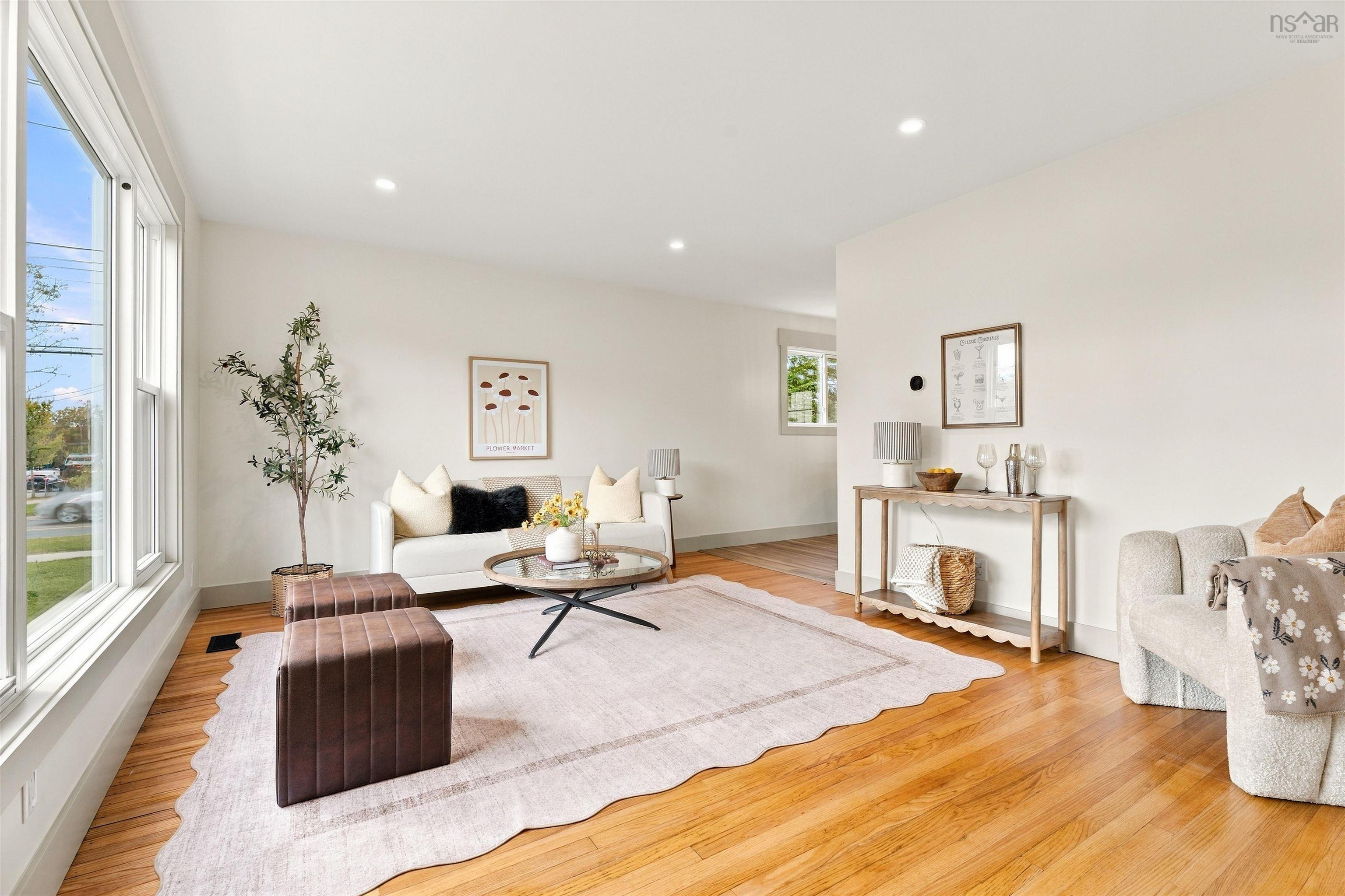 74 1/2 Belle Vista Drive, Dartmouth, NS (MLS® 202625912) — Wood-finish flooring, recessed lighting, and large windows
