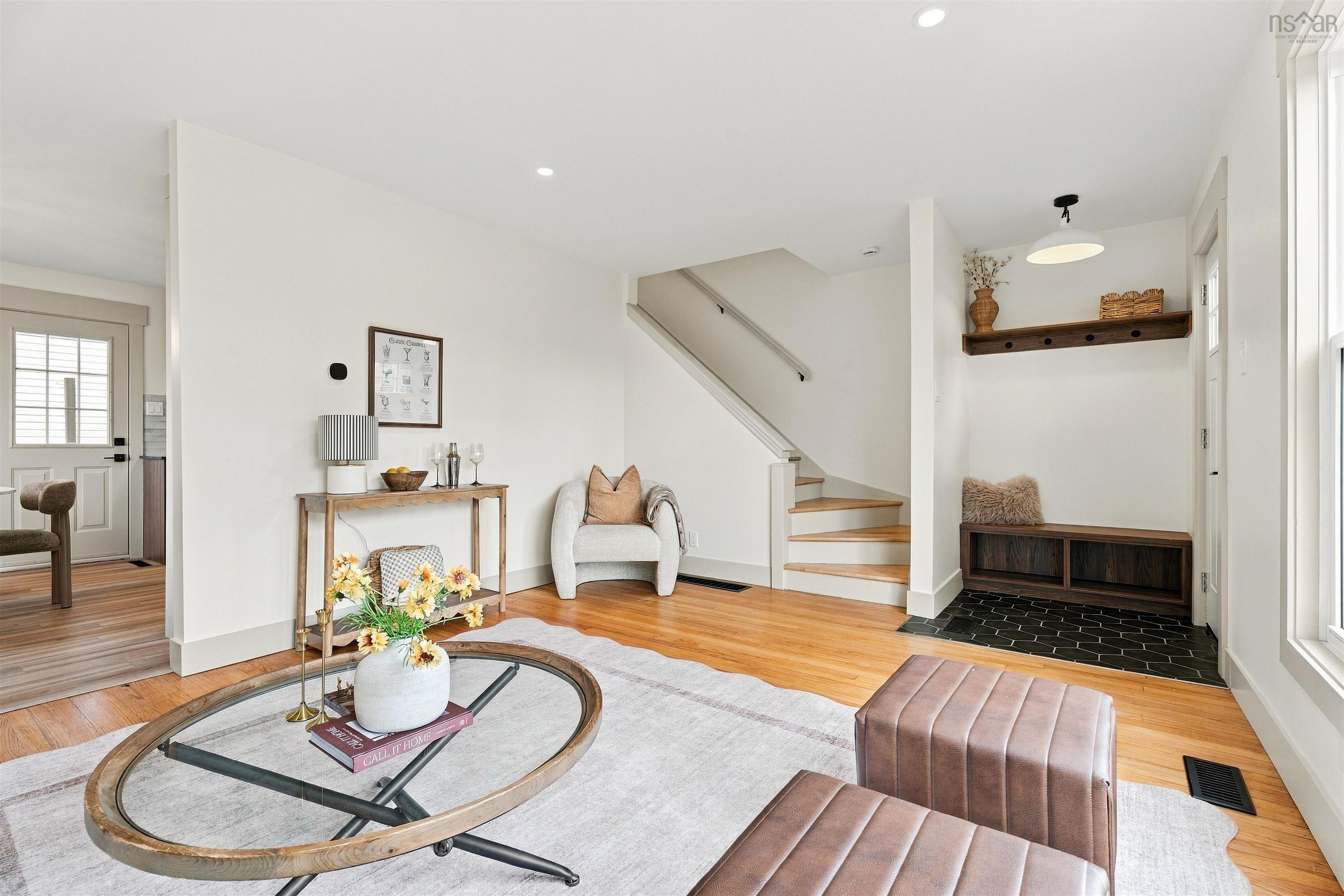 74 1/2 Belle Vista Drive, Dartmouth, NS (MLS® 202625912) — Interior space featuring wood-finish flooring, recessed lighting, and a built-in mudroom nook with integrated bench seating and shelving