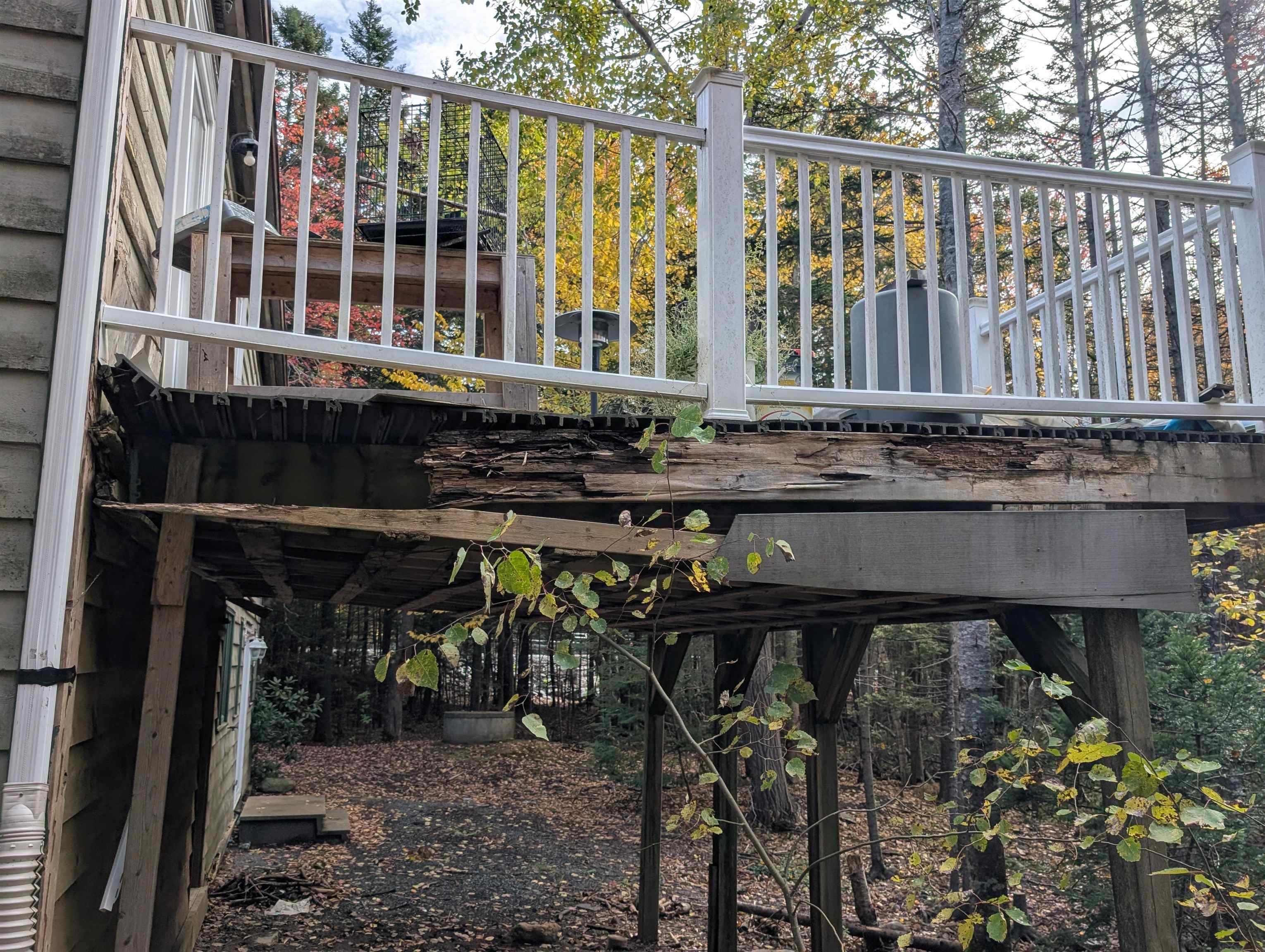 19 Foster Avenue, Fall River, NS (MLS® 202625937) — Elevated deck featuring a white balustrade and exposed structural framing