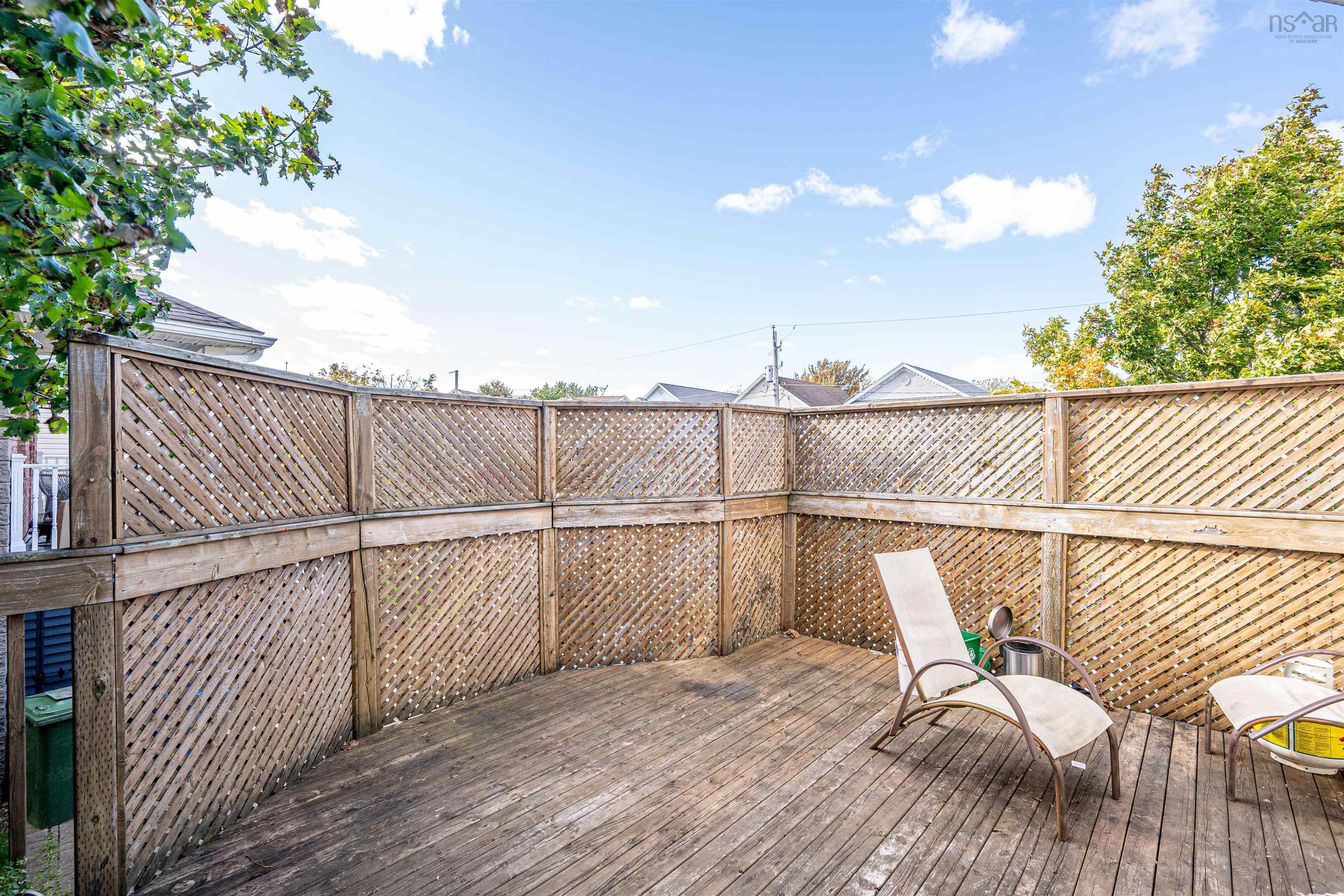 34 Lancaster Drive, Clayton Park, NS (MLS® 202626151) — Outdoor deck featuring wood plank flooring and wood lattice privacy fencing