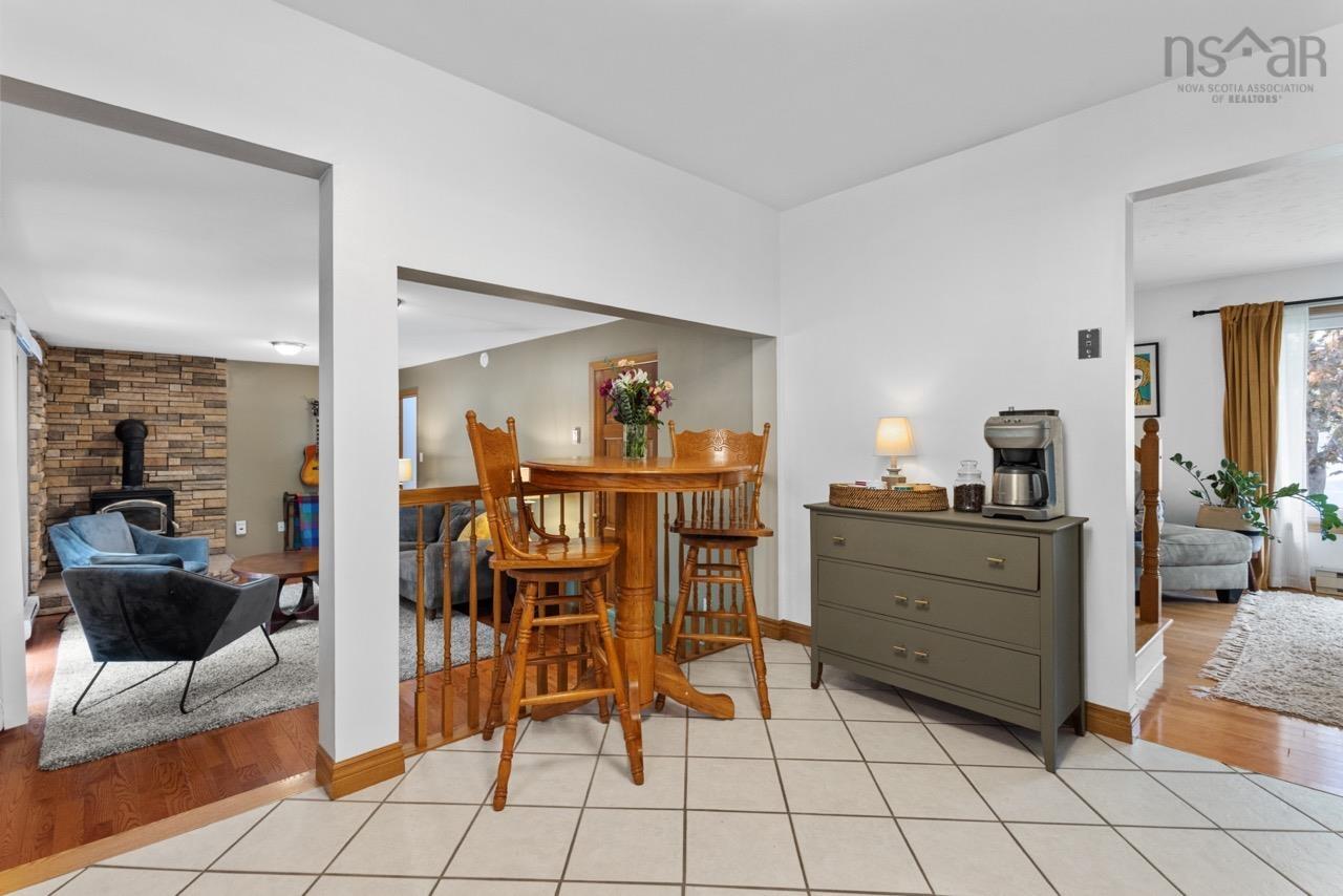 24 Rossi Drive, Dartmouth, NS (MLS® 202626410) — Tile flooring, wood-finish flooring, and a stone-clad hearth