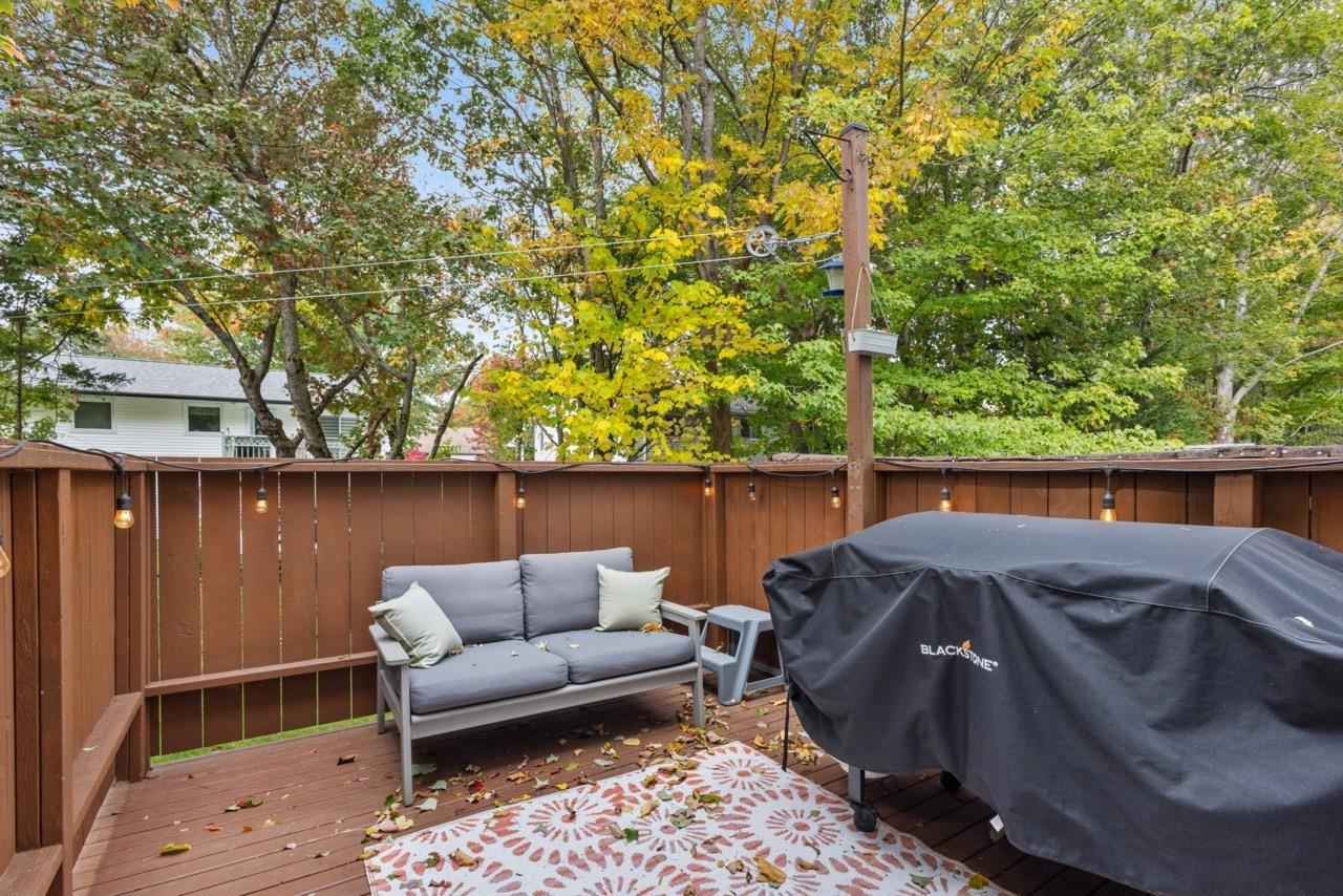 24 Rossi Drive, Dartmouth, NS (MLS® 202626410) — Elevated outdoor deck featuring stained wood decking and a perimeter privacy fence