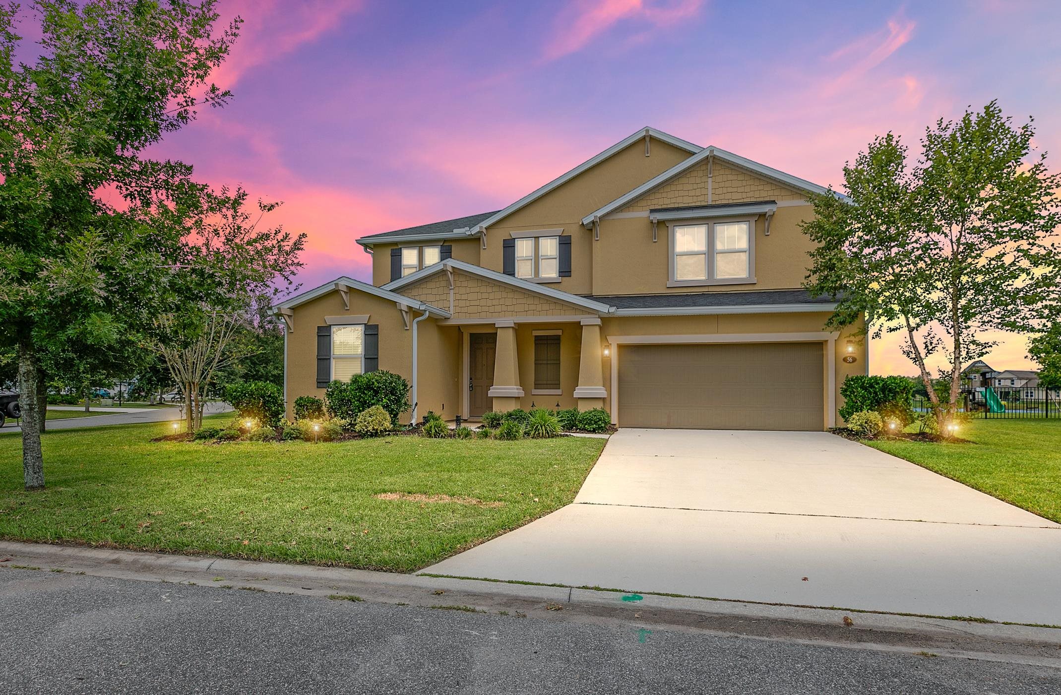 Welcome to this stunning 5-bedroom, 3.5-bath home located in the highly desirable Glen St. Johns community, tucked away in the back of the neighborhood in The Reserve. Perfectly situated on a corner lot with peaceful water views, this property combines comfort, space, and convenience with easy access to I-95. Step inside to an inviting open floorplan filled with natural light. The heart of the home is the spacious kitchen, complete with granite countertops, stainless steel appliances, double ovens, and plenty of room for entertaining. A main-floor guest suite with a private ensuite bathroom offers comfort and privacy for visitors. Upstairs, you’ll find a versatile loft, generously sized secondary bedrooms, and a luxurious owner’s suite featuring a spa-like ensuite bath and a large walk-in closet. Outdoors, enjoy a big backyard with a screened-in porch—perfect for relaxing and taking in the serene views.