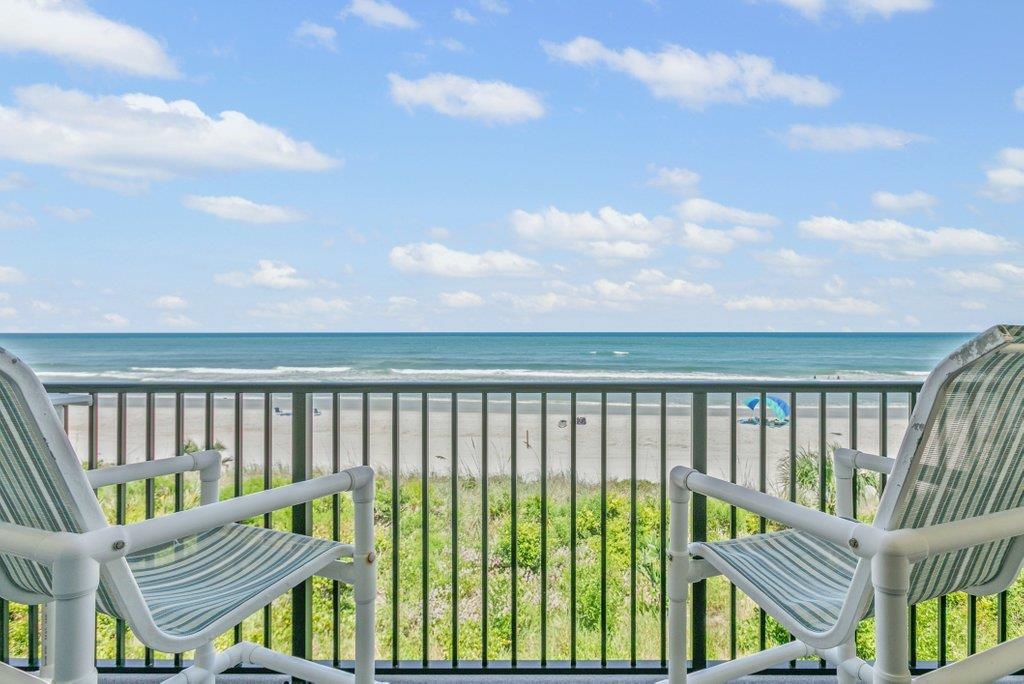 Experience the ultimate beachfront lifestyle in this stunning two-story, direct oceanfront townhome in the highly sought-after Summerhouse community! Step inside to find a beautifully updated kitchen featuring crisp white cabinets, granite countertops, and stainless steel appliances. The open-concept living and dining area flows seamlessly to a covered balcony, where you’ll enjoy breathtaking, unobstructed views of the Atlantic Ocean. Upstairs, both bedrooms offer their own ensuite bathrooms for comfort and privacy. The primary suite boasts a remodeled walk-in shower, adding a touch of spa-like luxury to your daily routine. As a Summerhouse resident, you’ll have access to an incredible array of resort-style amenities, including two heated pools, four private beach walkovers, RV/boat parking, pickleball and tennis courts, basketball courts, a fitness center, clubhouse, playground, on-site rental office, and a gated entrance for peace of mind.