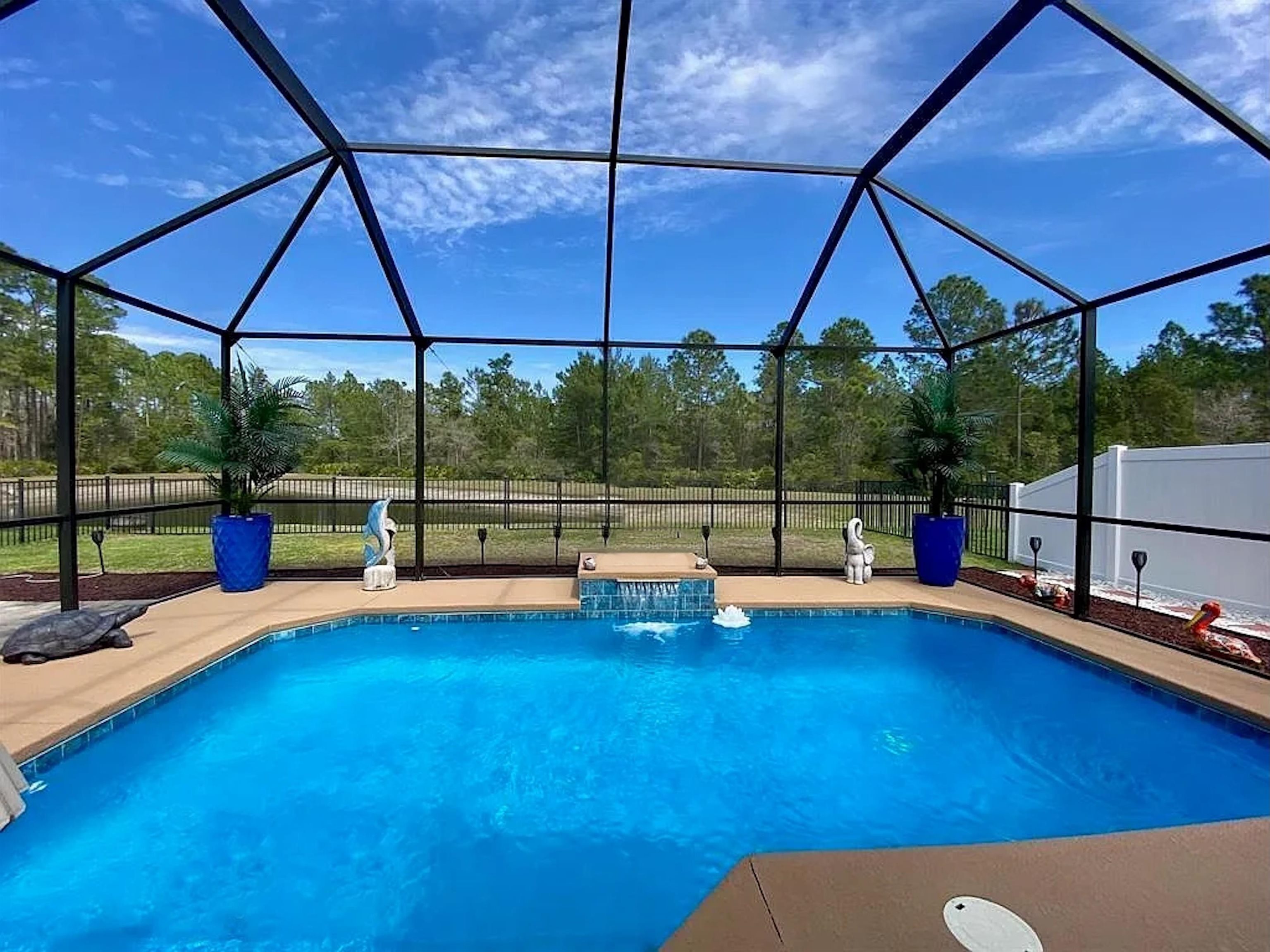 Andalusia pool home with pond and preserve views has it all and offers many options for flexible living needs. Move right in because all of the upgrades have already been done for you. A large screened in heated saltwater pool and a covered lanai flow seamlessly from your open concept great room/dining and kitchen for the best in indoor to outdoor living. This 4 bdr, 2.5 ba with primary on the main also has an upstairs extra spacious bonus area for secondary living. Enjoy newly updated kitchen cabinetry, quartz counters & backsplash, appliances, light fixtures and window coverings throughout. The primary has a large owners bath with a separate tub and shower and an oversized walk in closet. The pool area is fabulous with a covered lanai and a fully fenced yard, lush landscaping & paver areas and irrigation which round out the well thought out details.