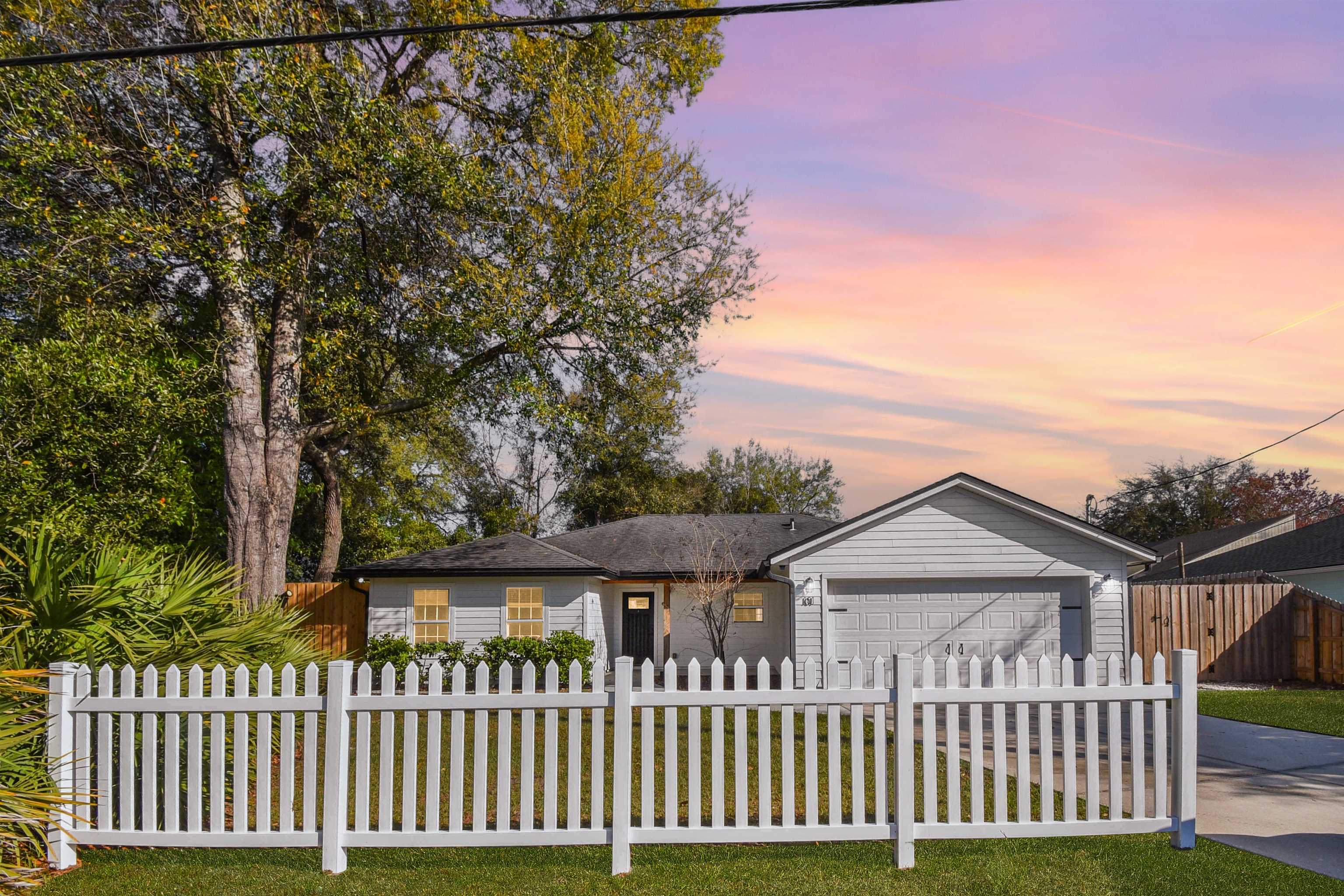 This beautifully updated 4-bedroom, 2-bathroom home offers 1,601 sq ft of comfortable living space and is ready for immediate move-in. The home features brand new appliances, new luxury vinyl plank (LVP) flooring throughout, and a cozy electric fireplace that adds warmth and character to the living area. A spacious primary suite includes a large walk-in closet, while the 2-car garage provides ample parking and storage. Designed for both comfort and functionality, this pet-friendly property is perfect for those looking for a well-maintained home with modern upgrades.  The fully fenced backyard is a standout feature, offering low-maintenance astro turf, a private putting green, and a relaxing pergola, creating the perfect outdoor space for entertaining or unwinding.  Tenant is responsible for all utilities. First month's rent, last month's rent, and security deposit are due prior to move-in.