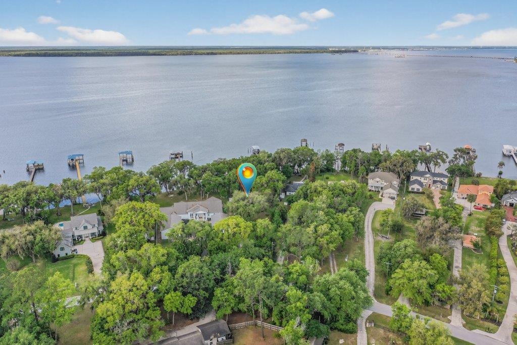 Riverfront opportunity ready for new owners to create their perfect waterfront retreat! Bring your vision and builder to this incredible location in a sought-after riverfront community. Nestled along the St. Johns River, you’ll enjoy peaceful waterfront living while still being just a short drive to Jacksonville, all within desirable St. Johns County.  Whether you’re looking to renovate, rebuild, or invest, the potential here is undeniable.