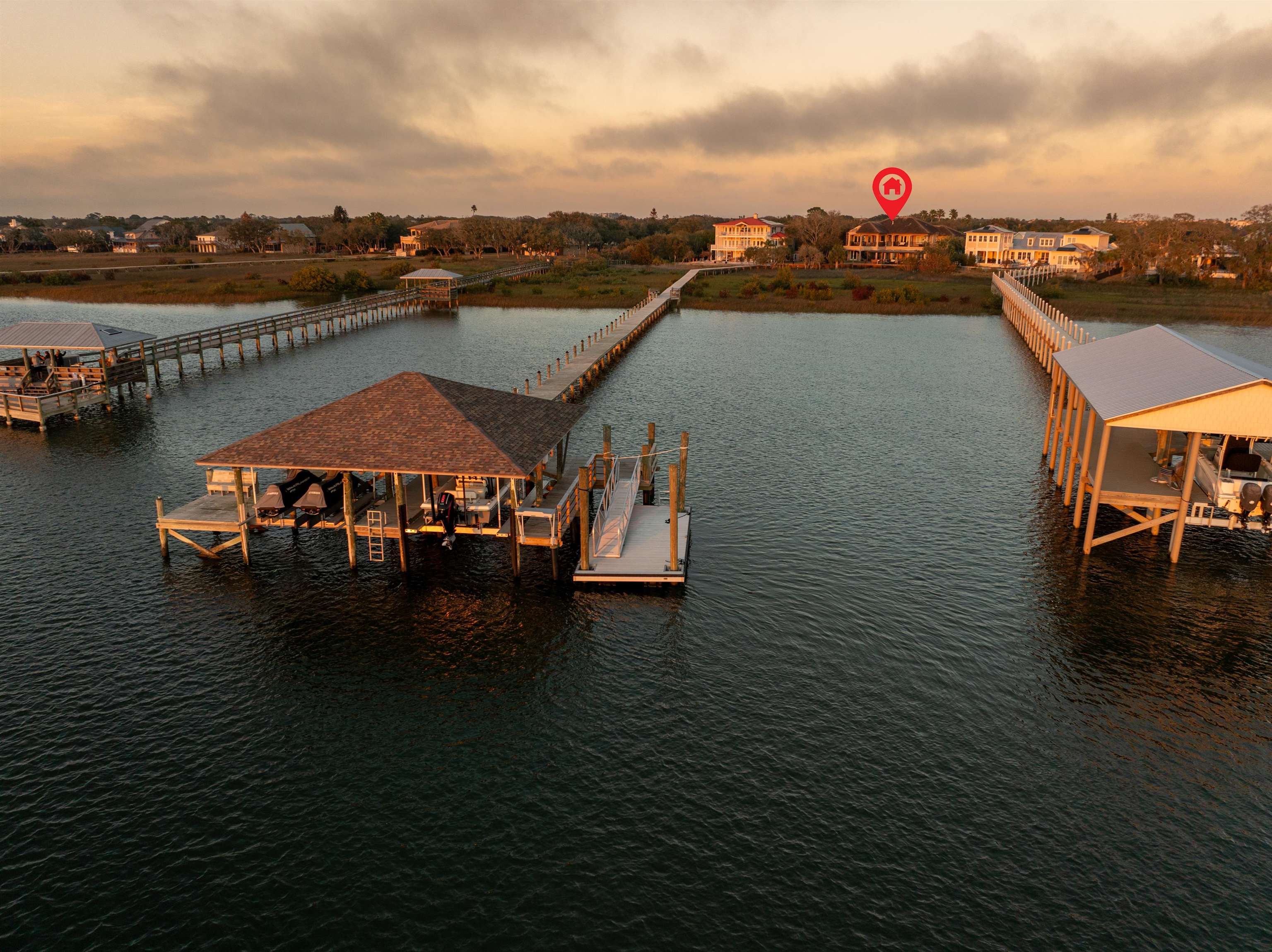 Dock area with a water view and boat lift Dock